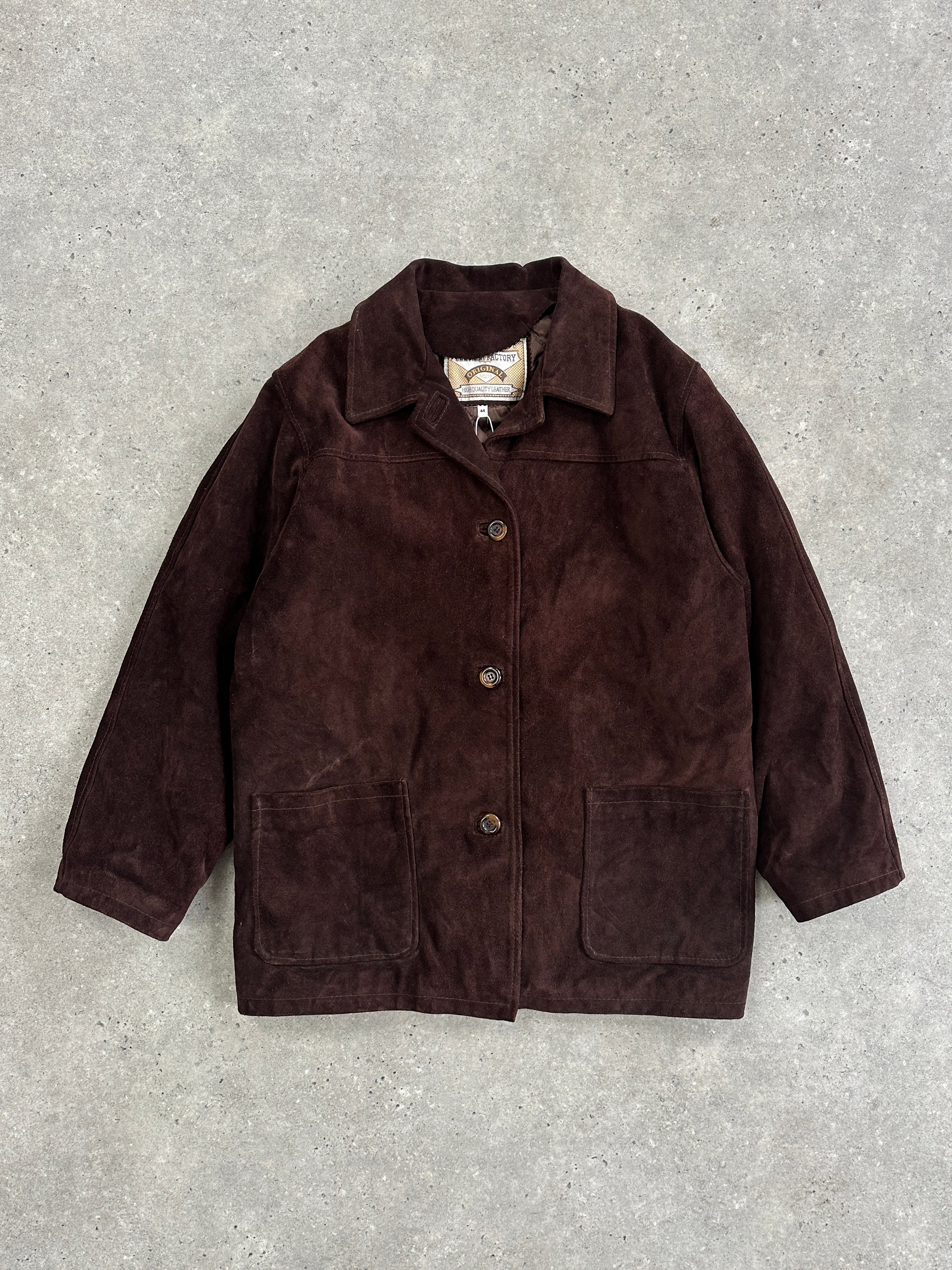 Vintage suede leather jacket in size M/L with classic design and textured material, shown on a hanger.