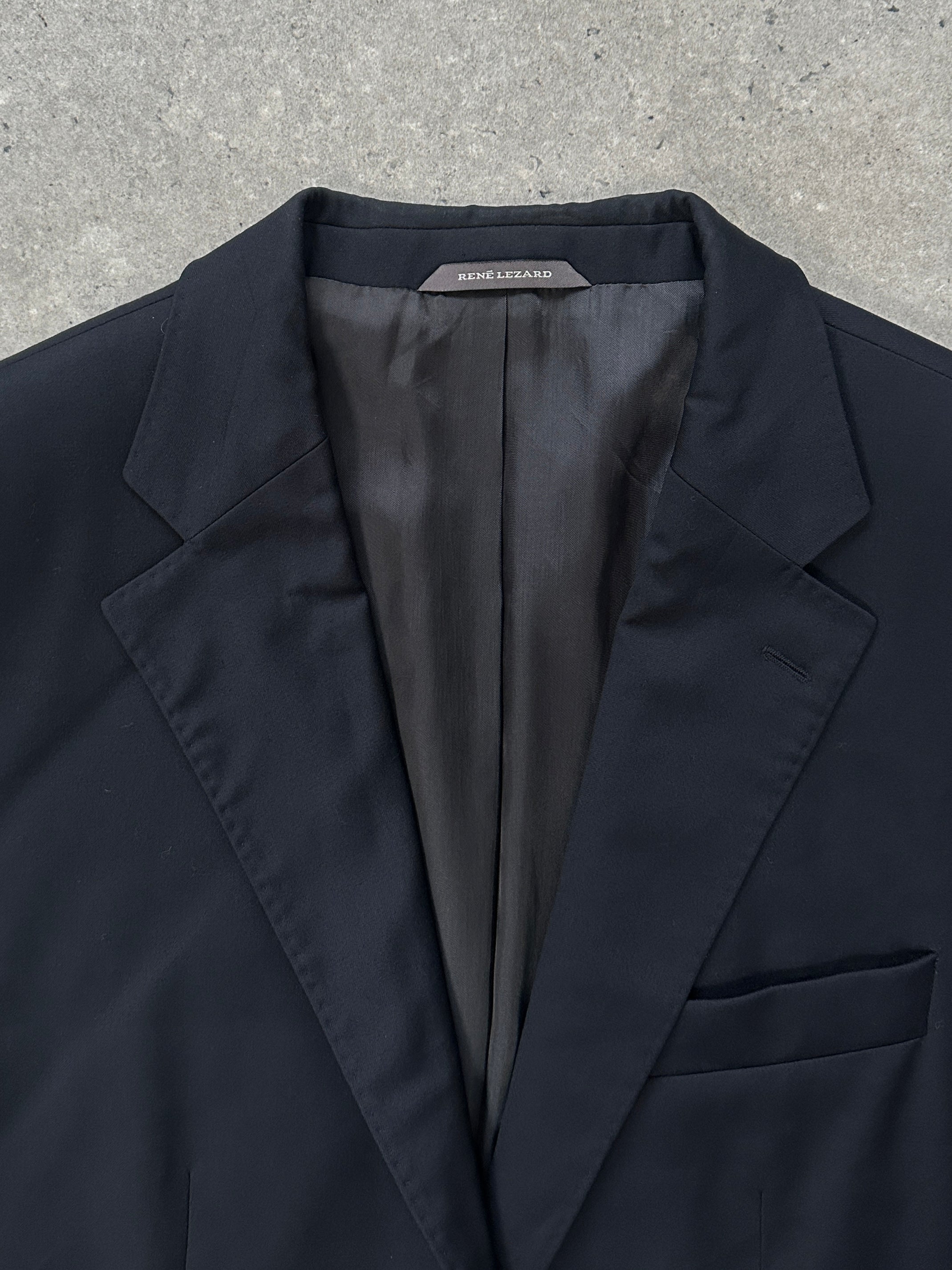 Loro Piana Rene Lezard 2000s single-breasted high-neck wool blazer in size 40L, displayed on a hanger.