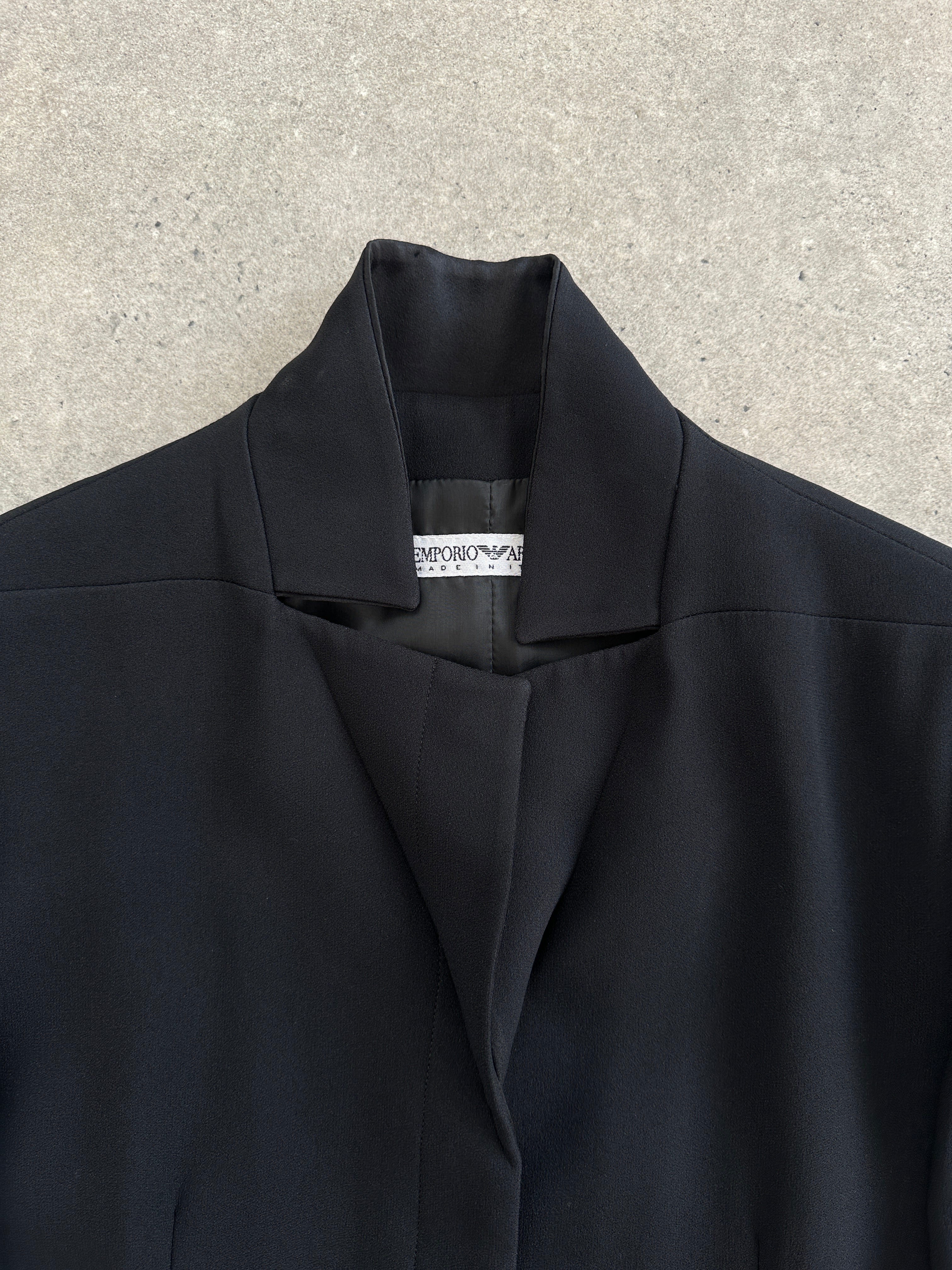 Emporio Armani 1990s high-neck tailored blazer jacket in dark fabric, sleek design, and structured fit.