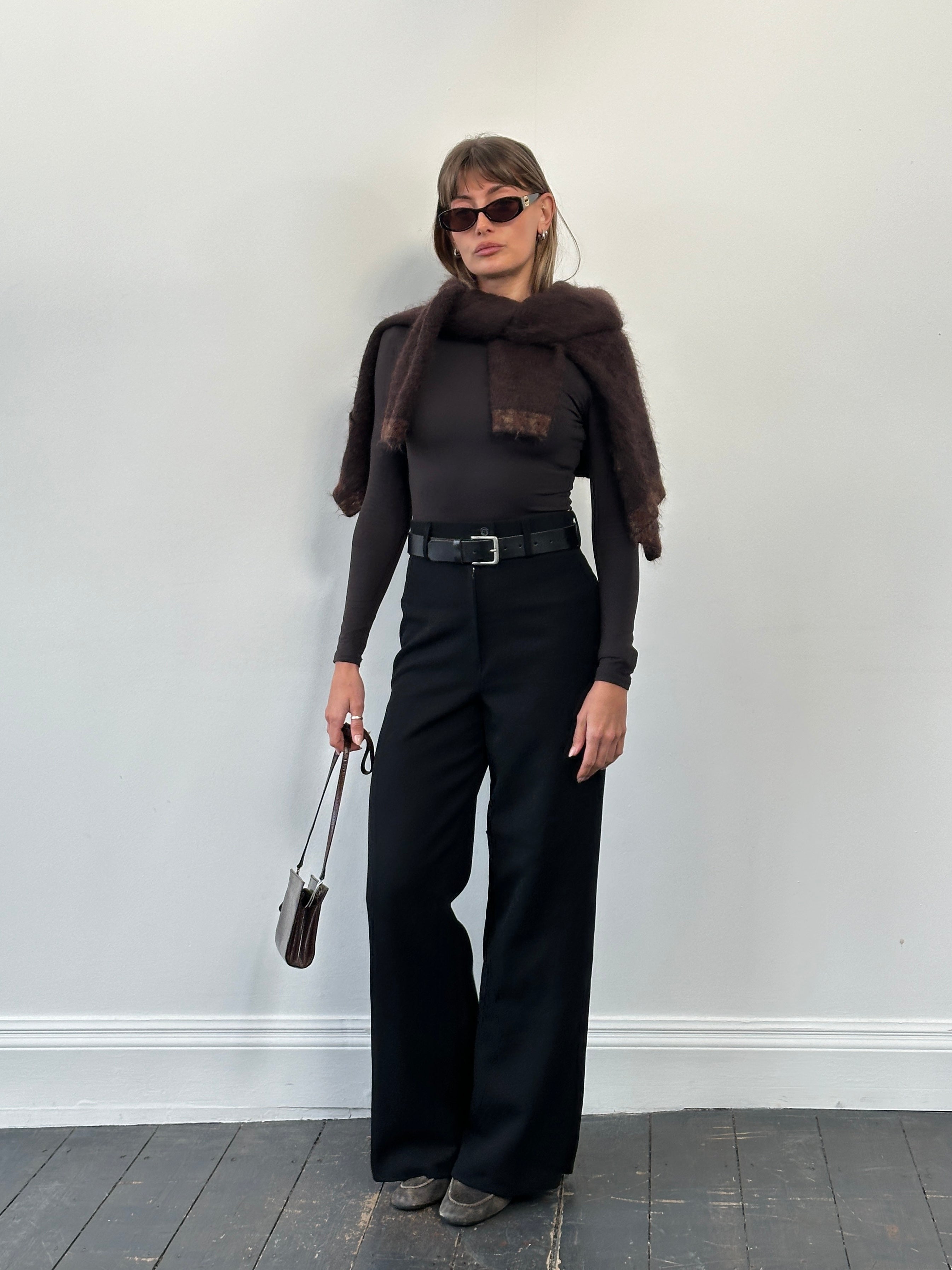 Vintage 1990s pure wool wide-leg tailored trousers in size W26, showcasing classic vintage style and high-quality fabric.