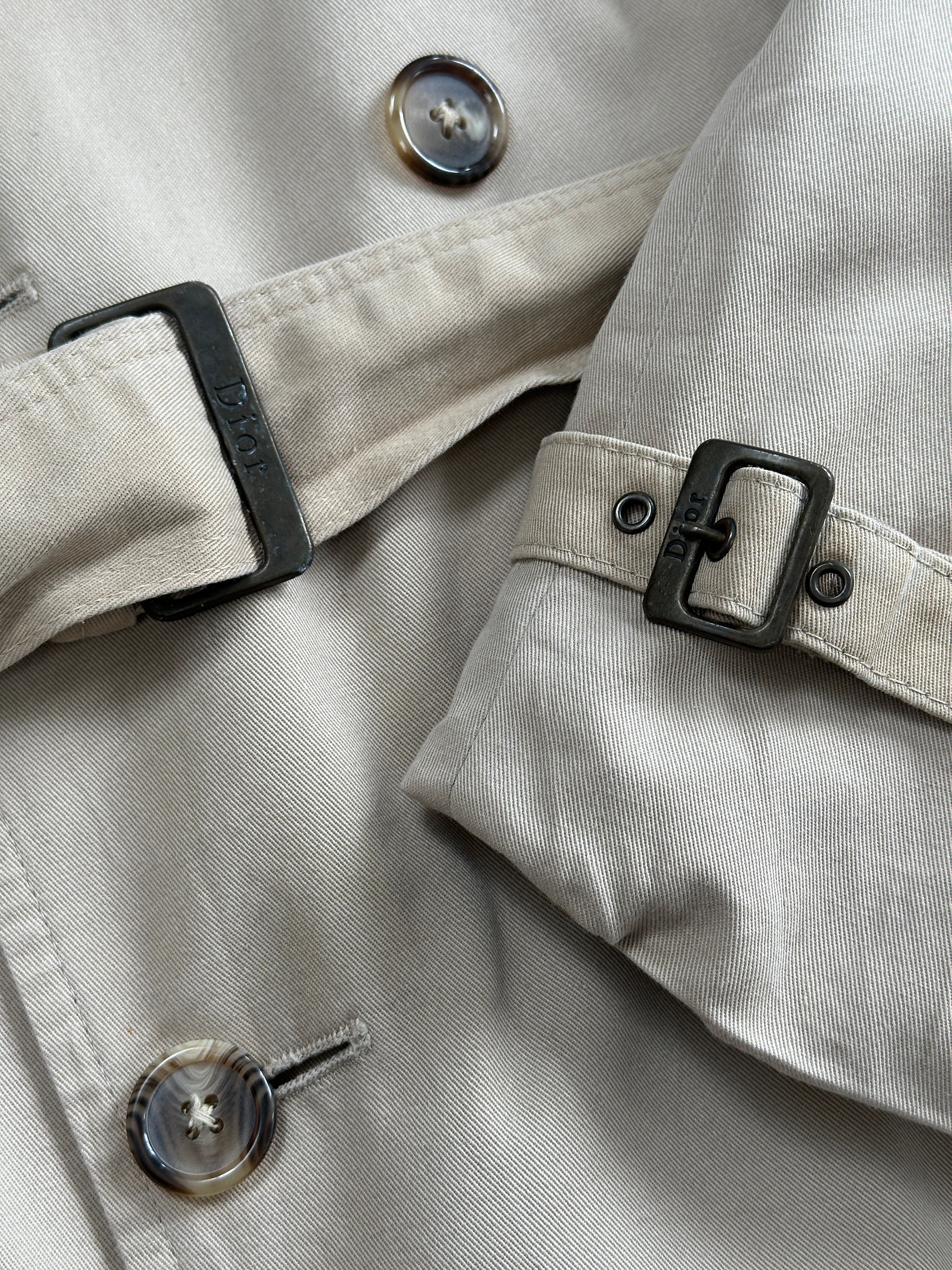 Christian Dior Monsieur cotton double-breasted belted trench coat in beige, L/XL, shown on a hanger with classic design details.