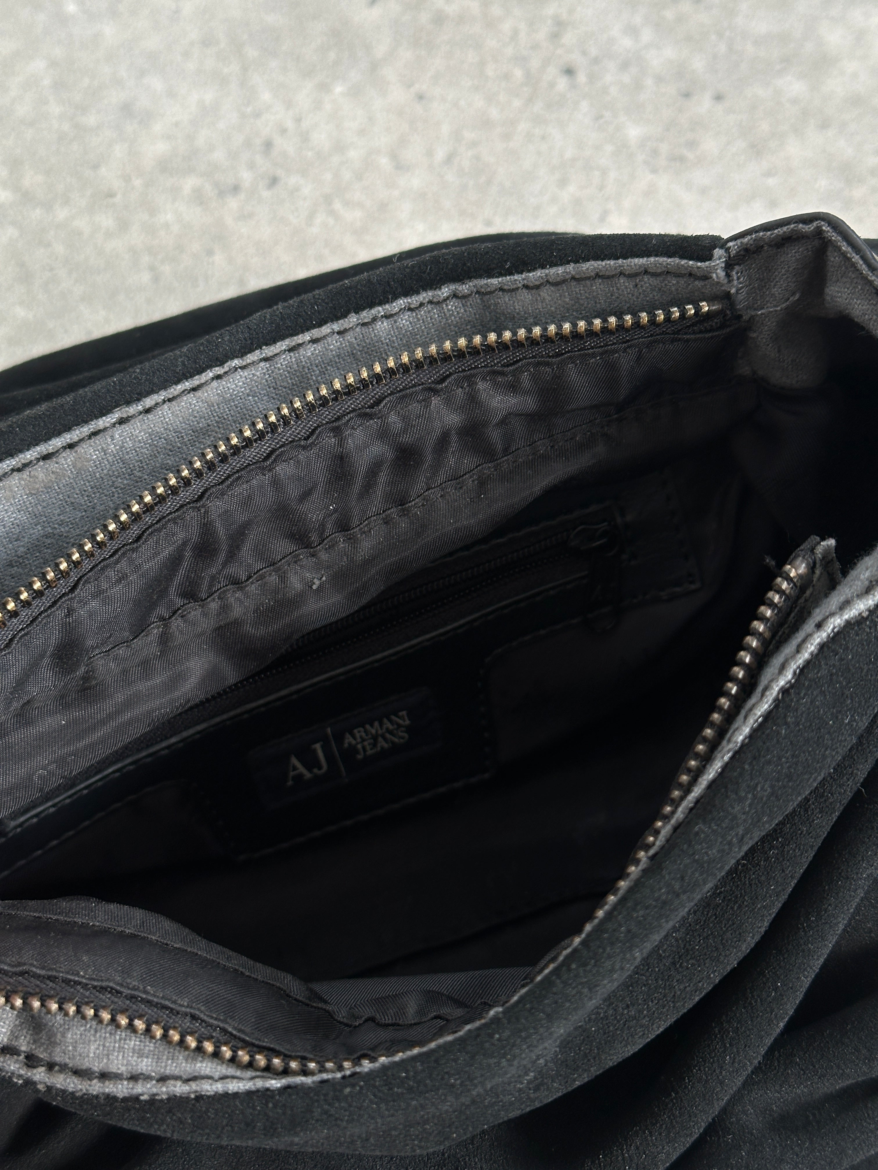 Armani Jeans suede ruched shoulder bag with fold-over flap and silver hardware, stylish accessory for casual and formal outfits.