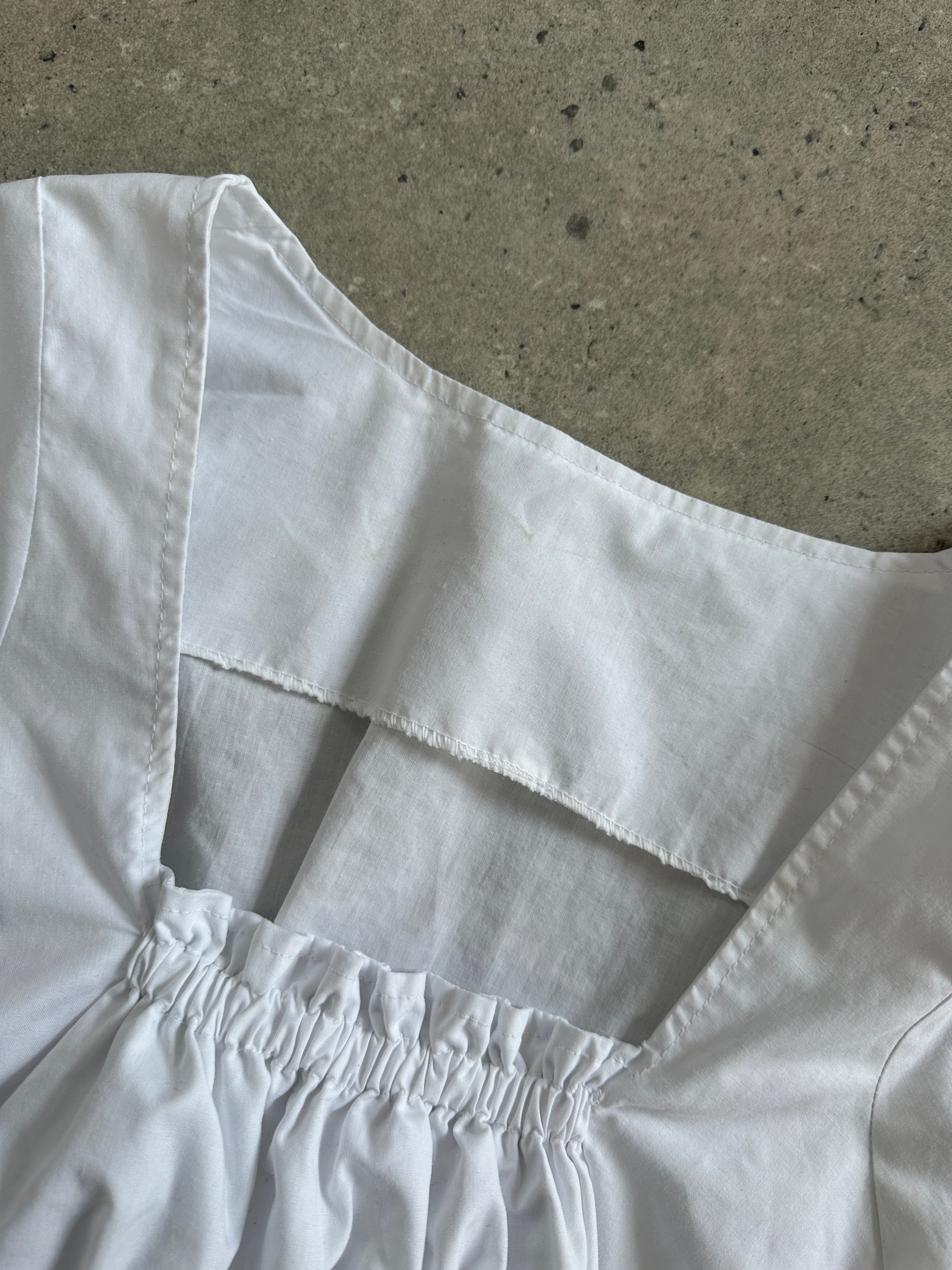 Vintage 2000s cotton crop top with ruched square neckline, in size small, featuring a trendy vintage fashion style.