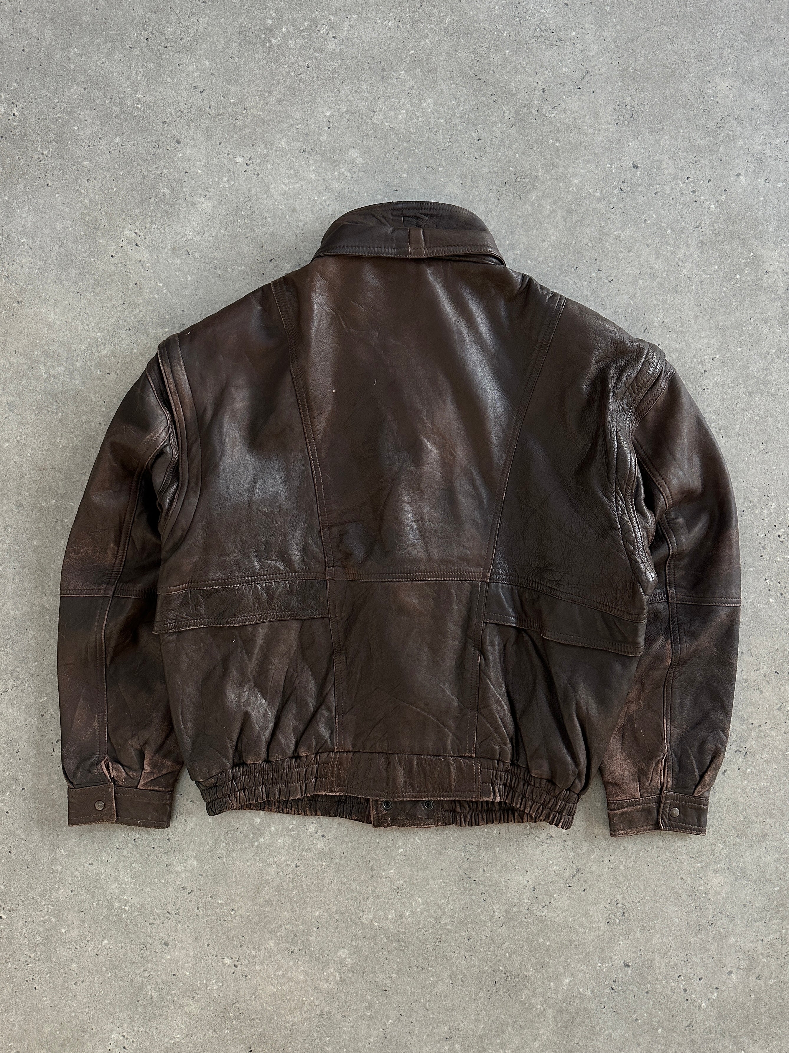 Vintage 1990s leather bomber jacket with double collar, aged look, in size XL, featuring classic vintage style and distressed leather.
