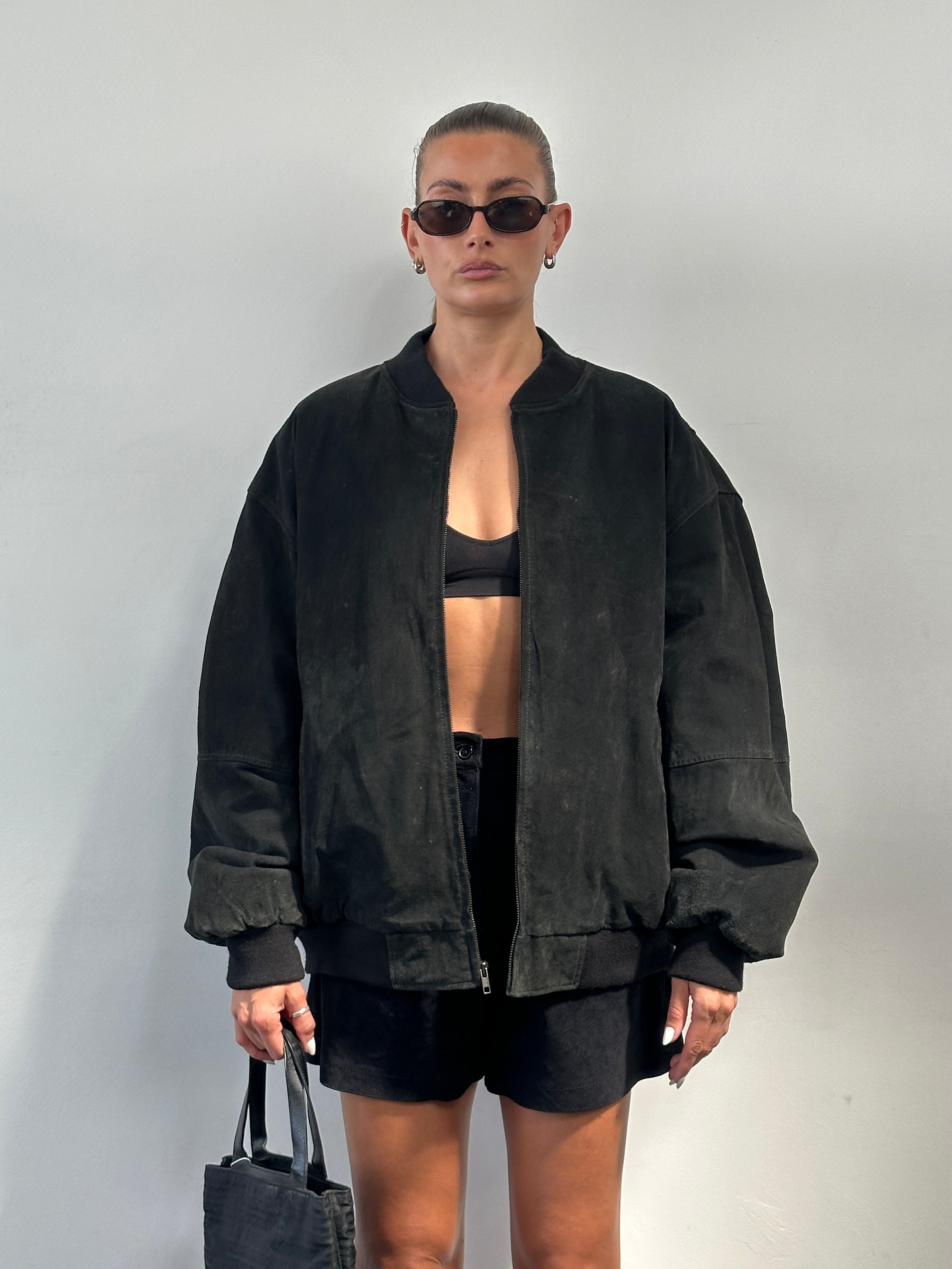 Vintage suede bomber leather jacket in XXL size, featuring a classic design with a soft, textured finish and ribbed collar.