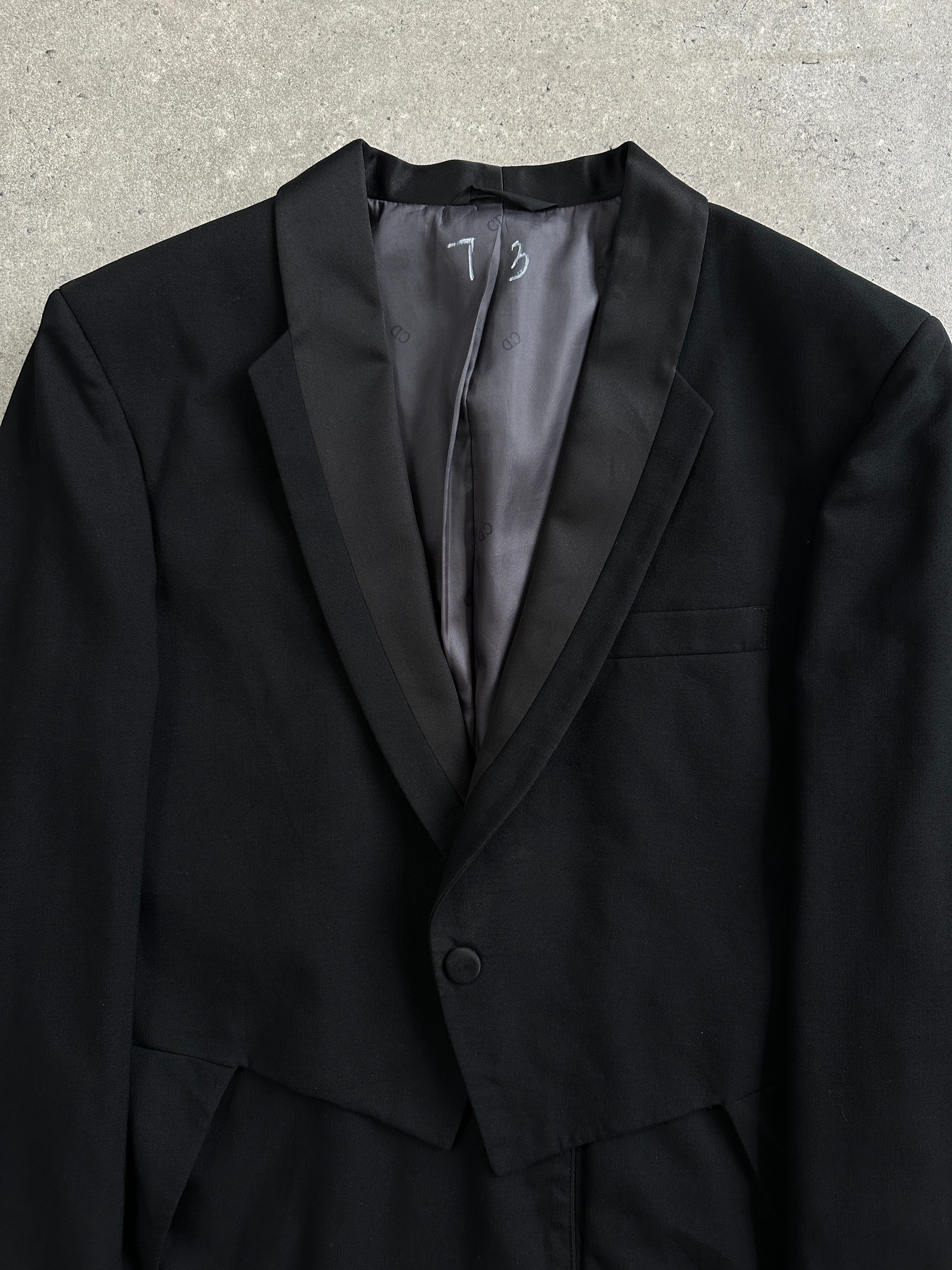 Christian Dior Grand Luxe 1980s tuxedo wool satin tailcoat blazer with structured fit and classic black design.