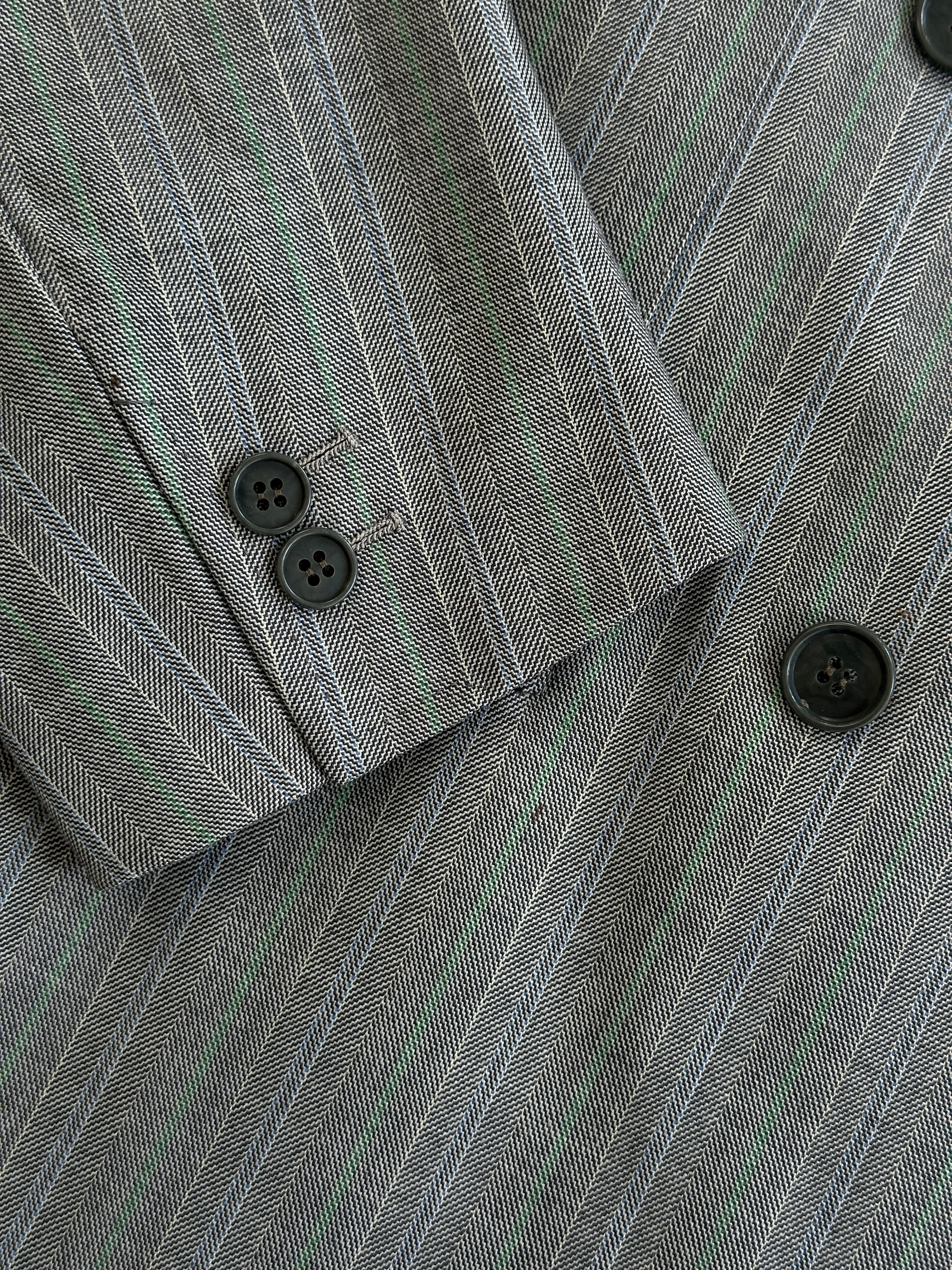 Vintage Italian vintage pure wool stripe double-breasted suit, size 36R/W28, featuring classic tailored design and bold stripe pattern.