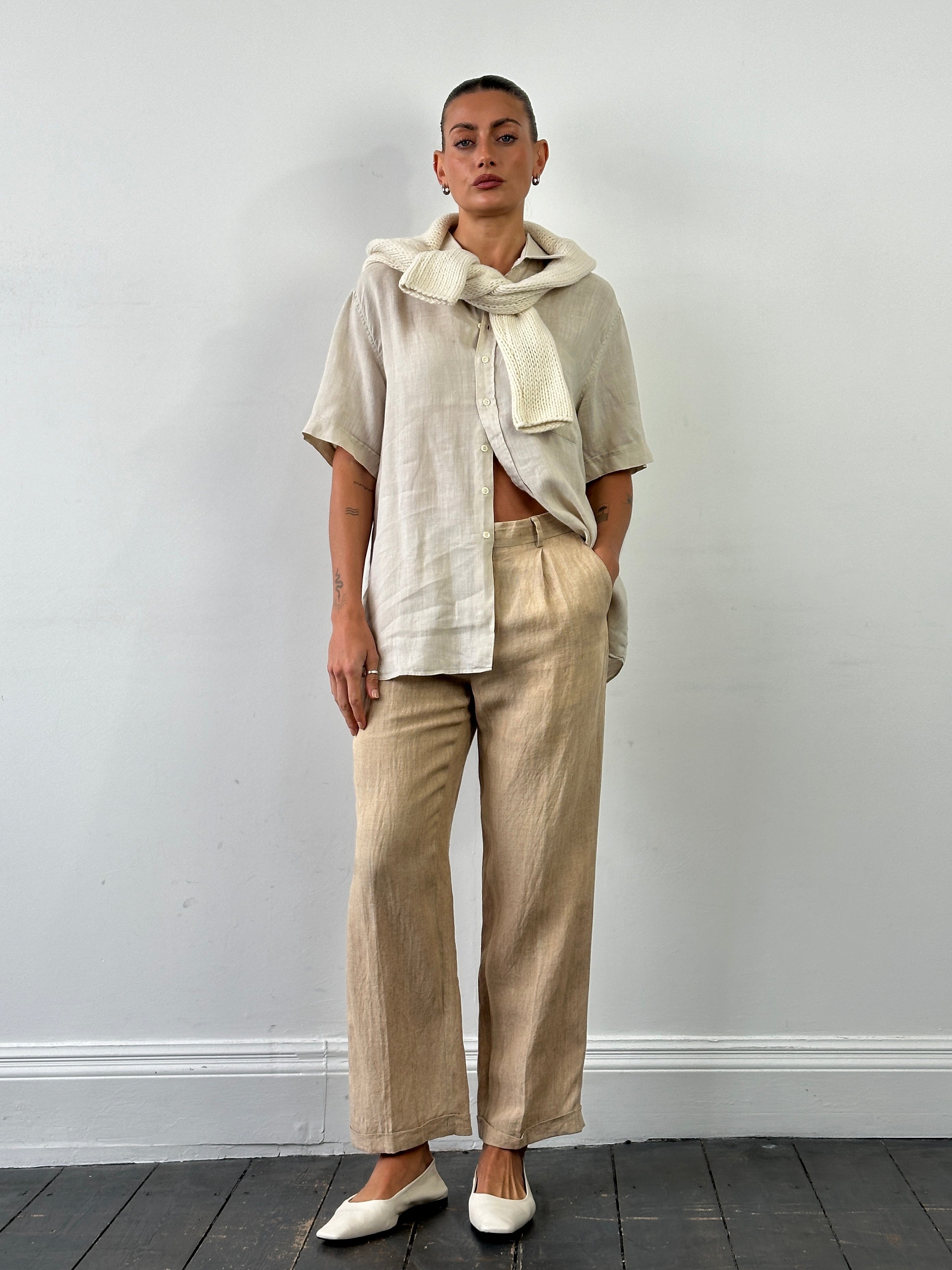 Vintage pure linen straight leg pleated trousers in size W32, featuring classic design and tailored fit in natural linen fabric.