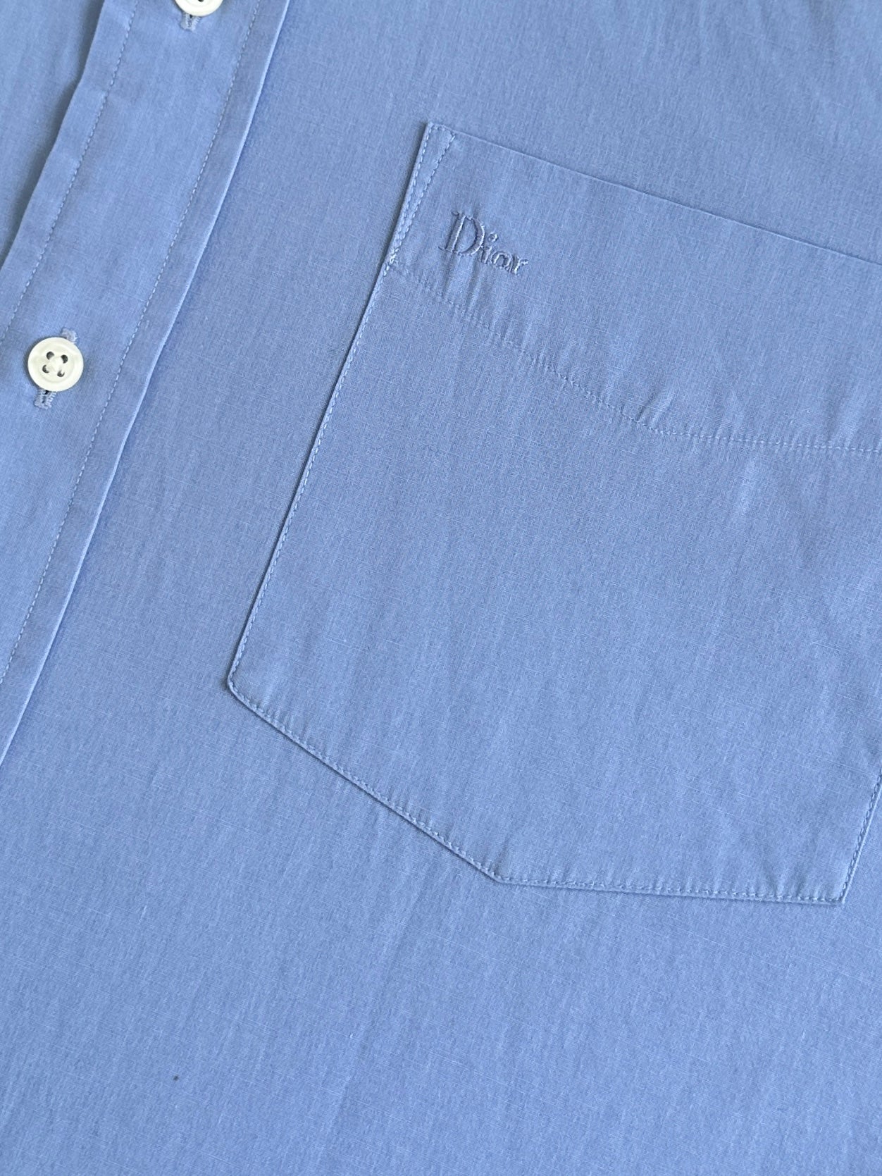 Christian Dior Monsieur cotton logo shirt in size L, featuring the classic Dior logo and clean white fabric.