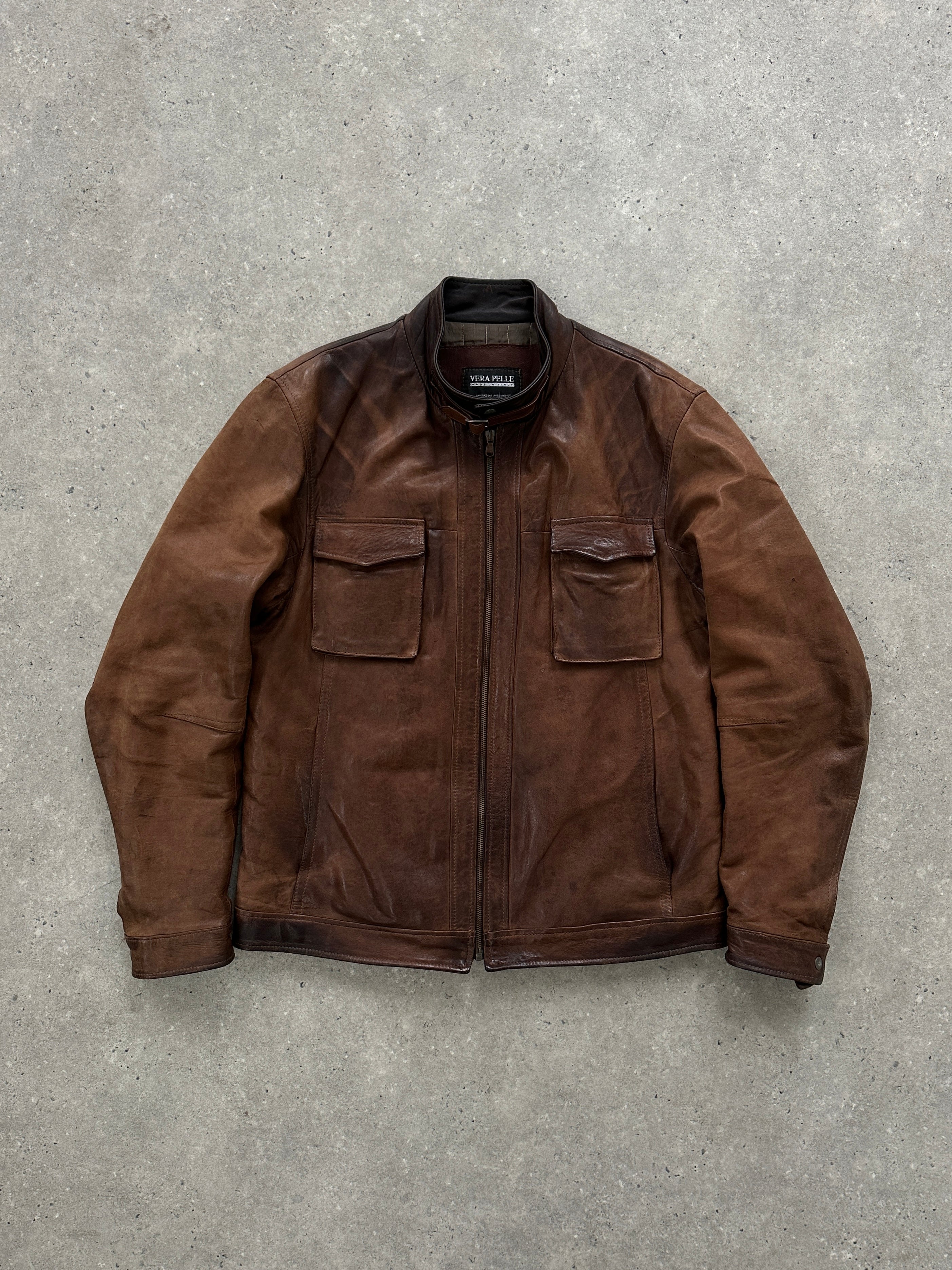 Vintage Italian aged leather jacket in size large, featuring classic design and rich, distressed leather details.