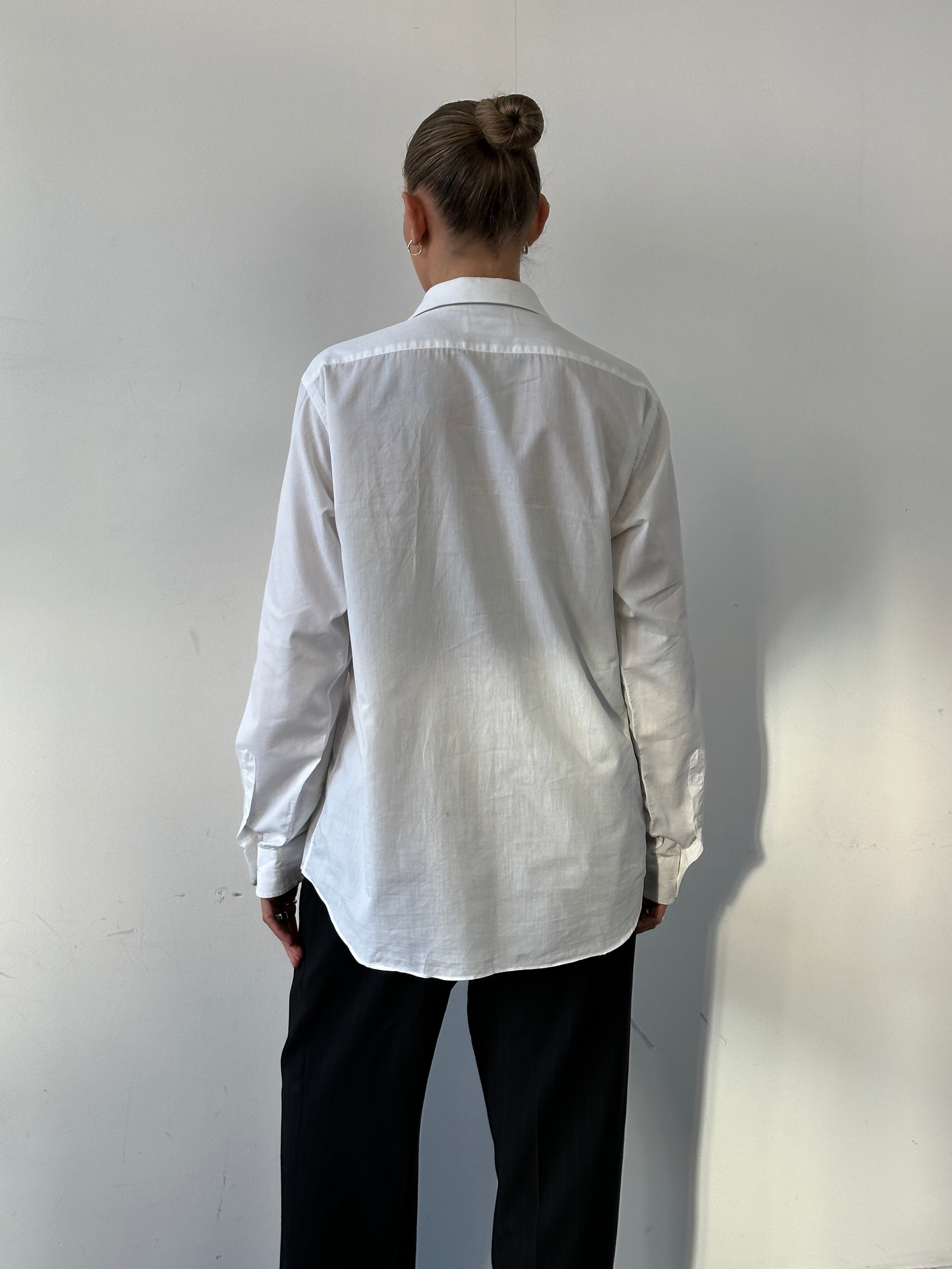 Christian Dior cotton logo shirt in size M/L, featuring a classic design with the Dior brand logo on the front.