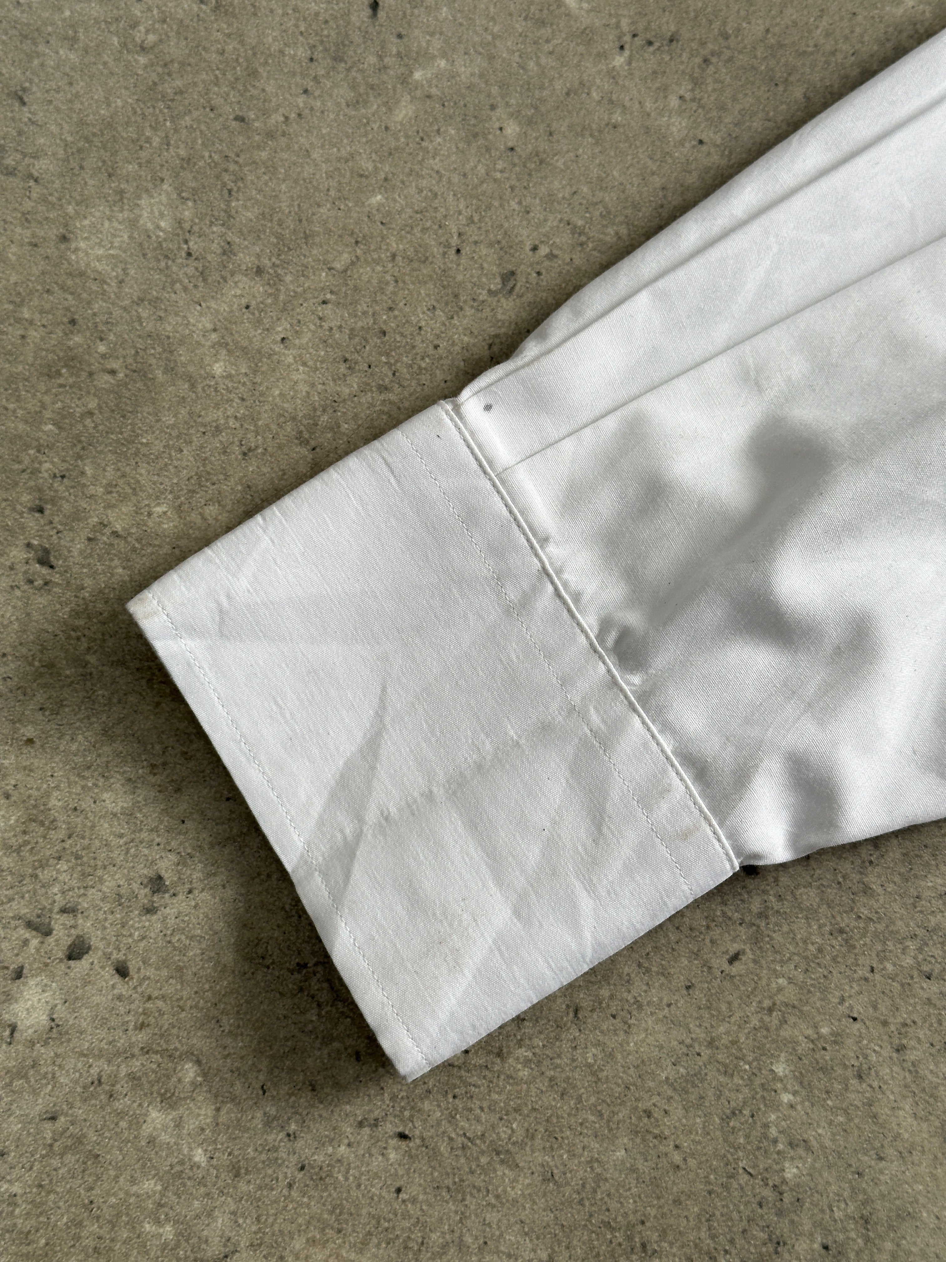 Yves Saint Laurent Pour Homme 2000s cotton logo shirt in XL, featuring classic design and prominent YSL branding on the front.