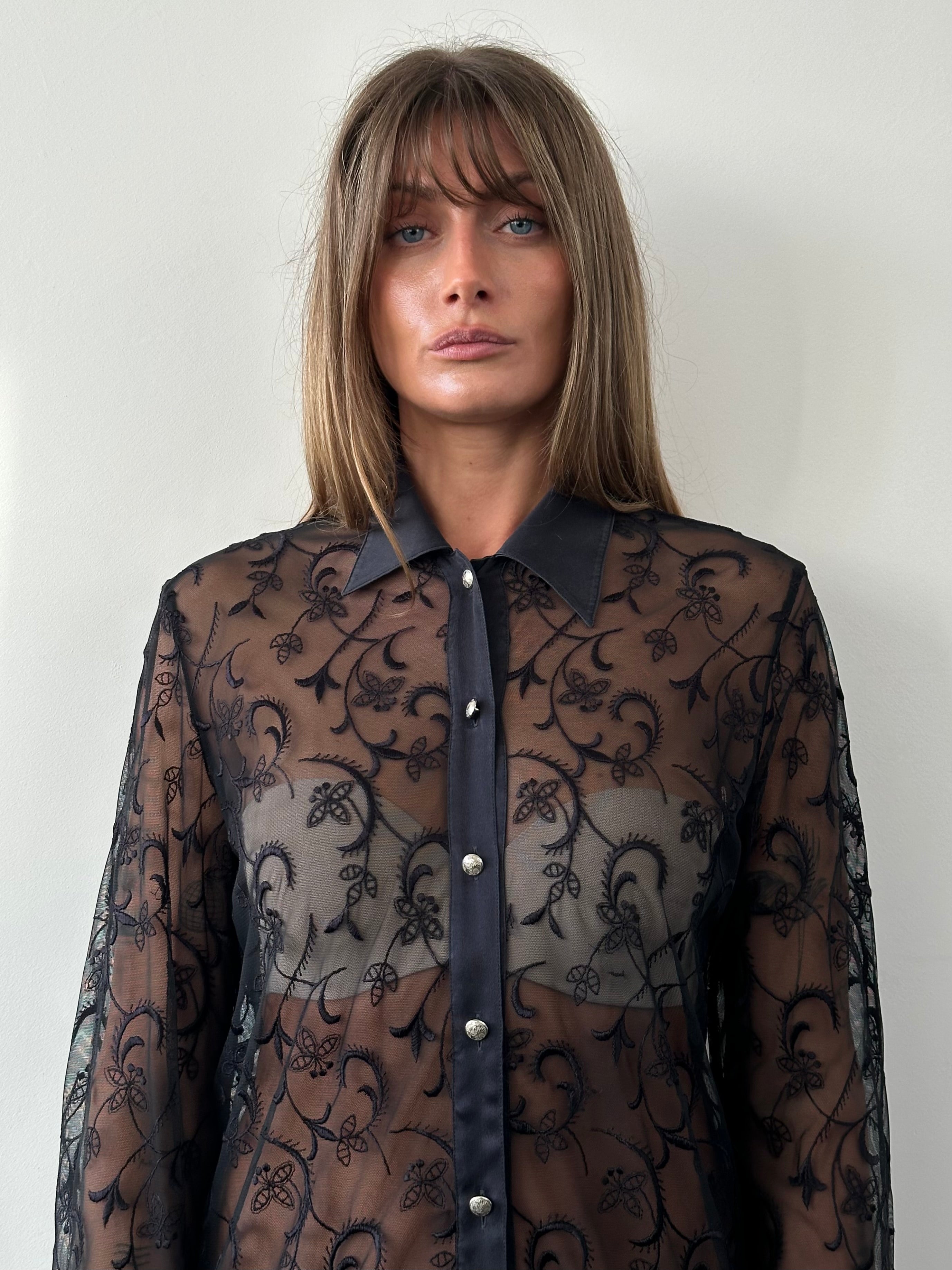 Vintage lace sheer silk trim shirt in size large, featuring delicate lace details and lightweight silk fabric.