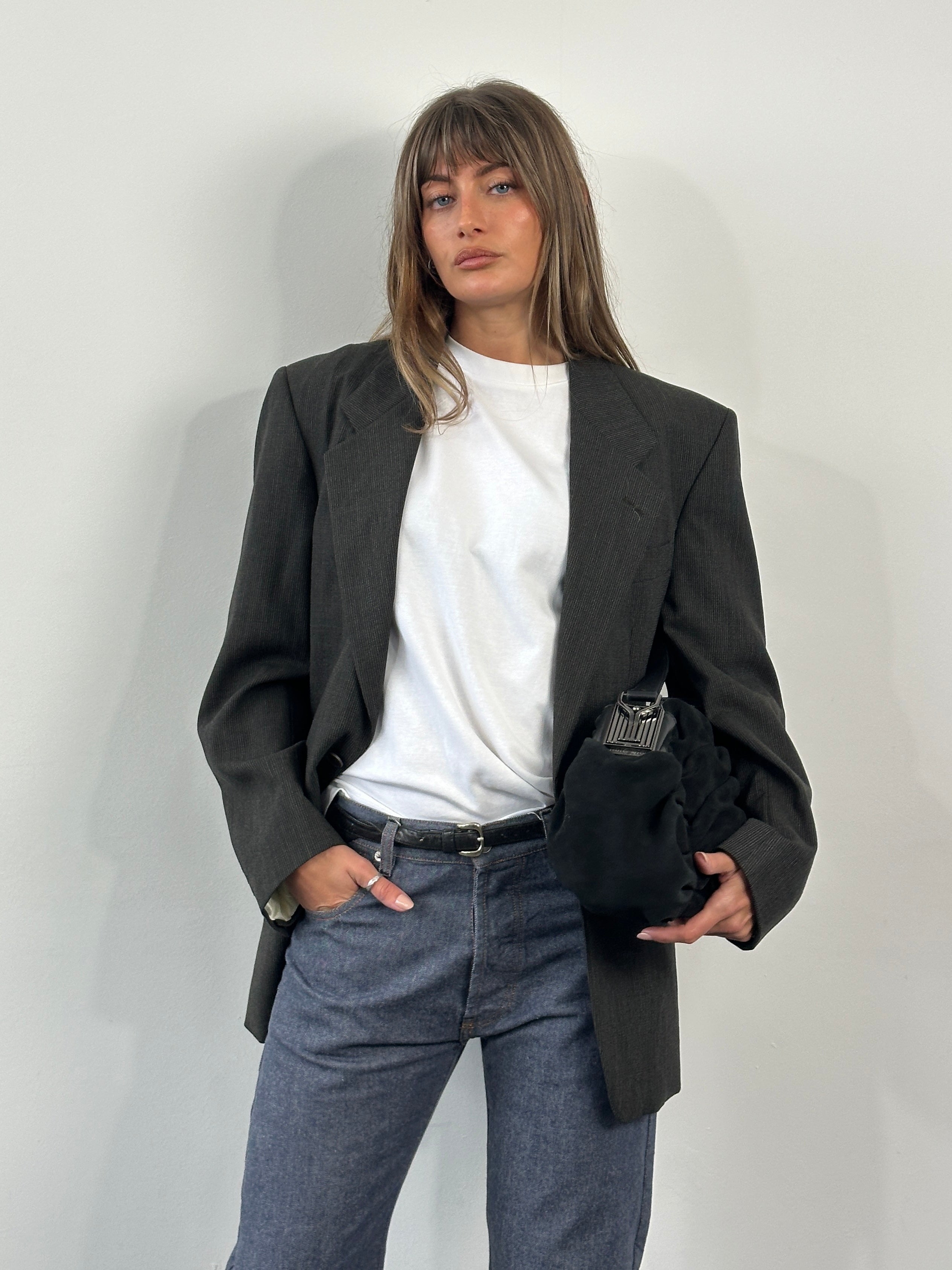 Yves Saint Laurent 1990s pure wool single-breasted blazer in size 40R/M, featuring classic tailored fit and elegant design.