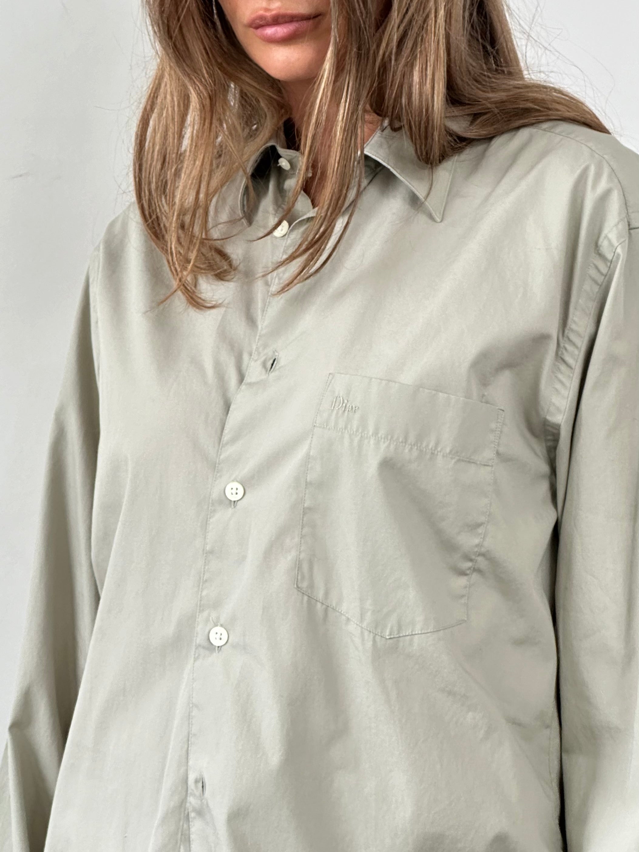 Christian Dior Monsieur pure cotton logo shirt in size M/L, featuring a classic design and visible Dior branding on the front.