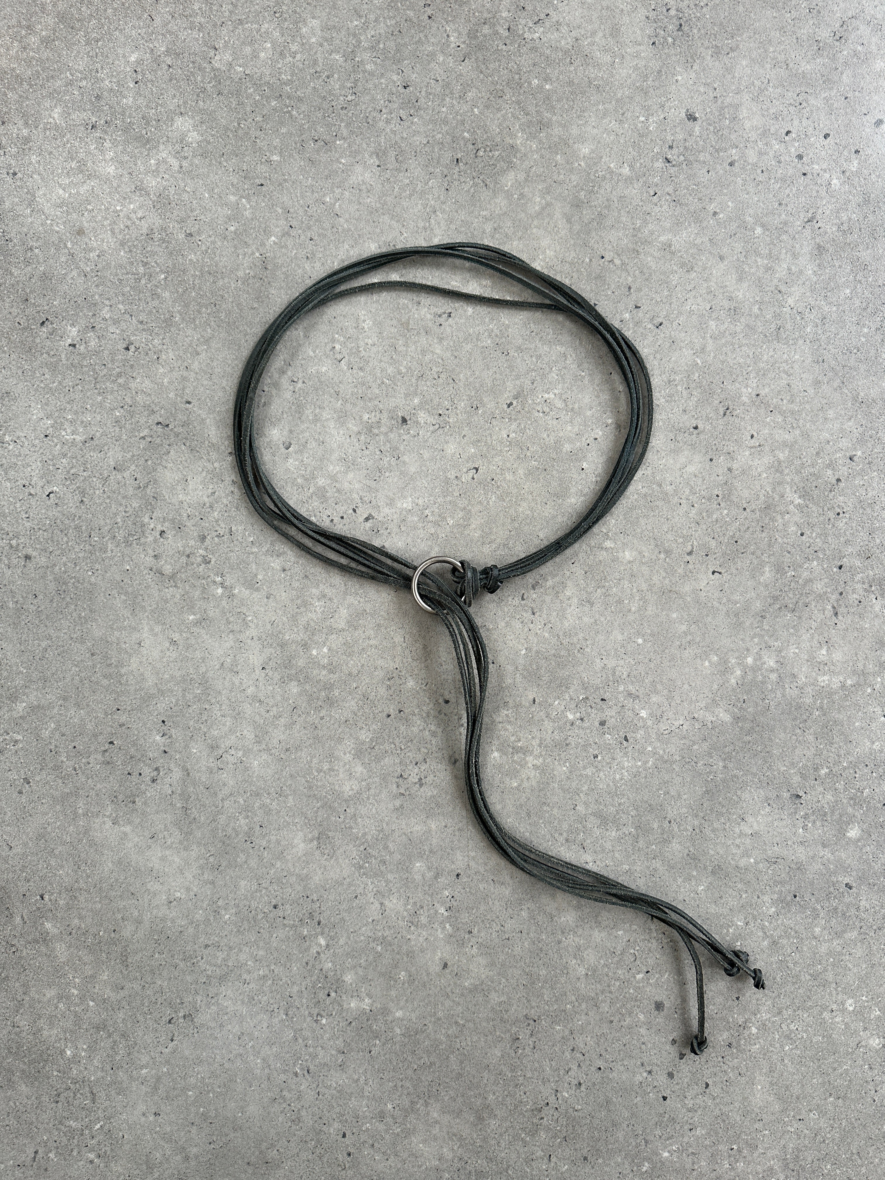 Vintage 1990s leather rope tassel belt with one size adjustable fit, featuring a classic tassel design and leather strap.