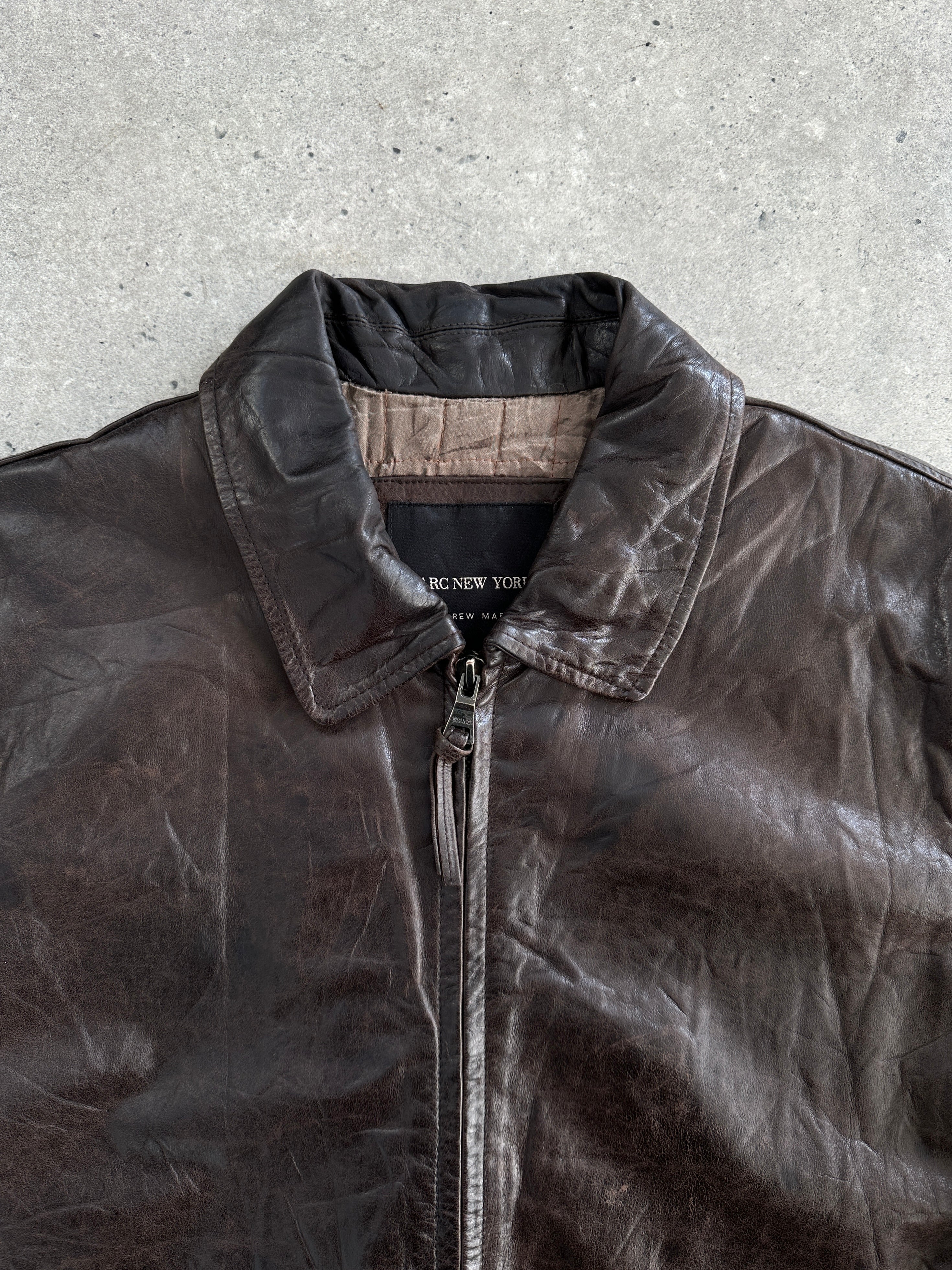 Vintage brand vintage crinkled leather jacket in XL size, showing textured distressed leather and classic jacket design.