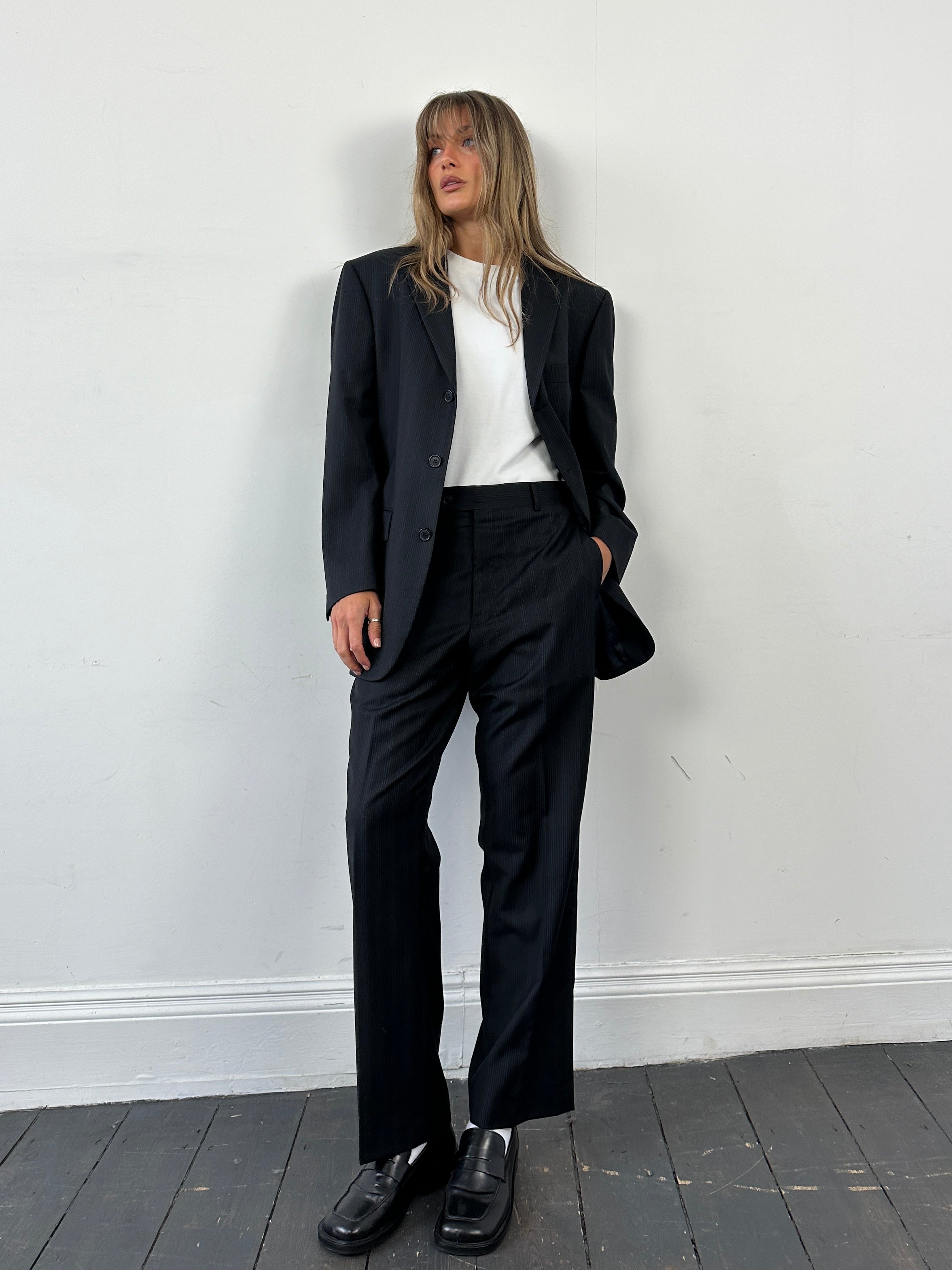 Yves Saint Laurent pinstripe pure wool jumpsuit in size 40S/W32, single-breasted with tailored fit and classic style.