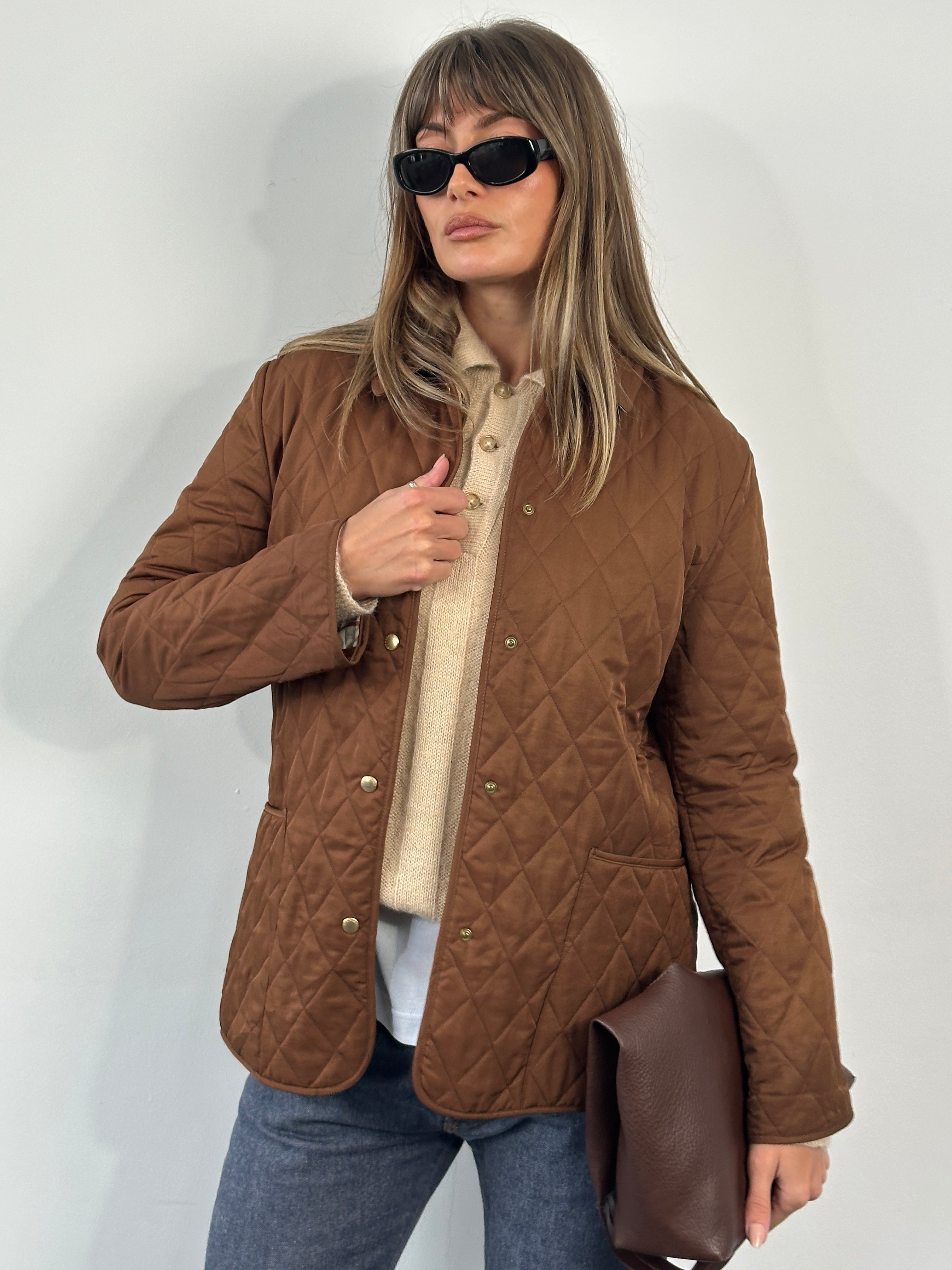 Burberry 2000s quilted Nova Check jacket in size M, featuring classic check pattern and quilted design, stylish and warm coat.