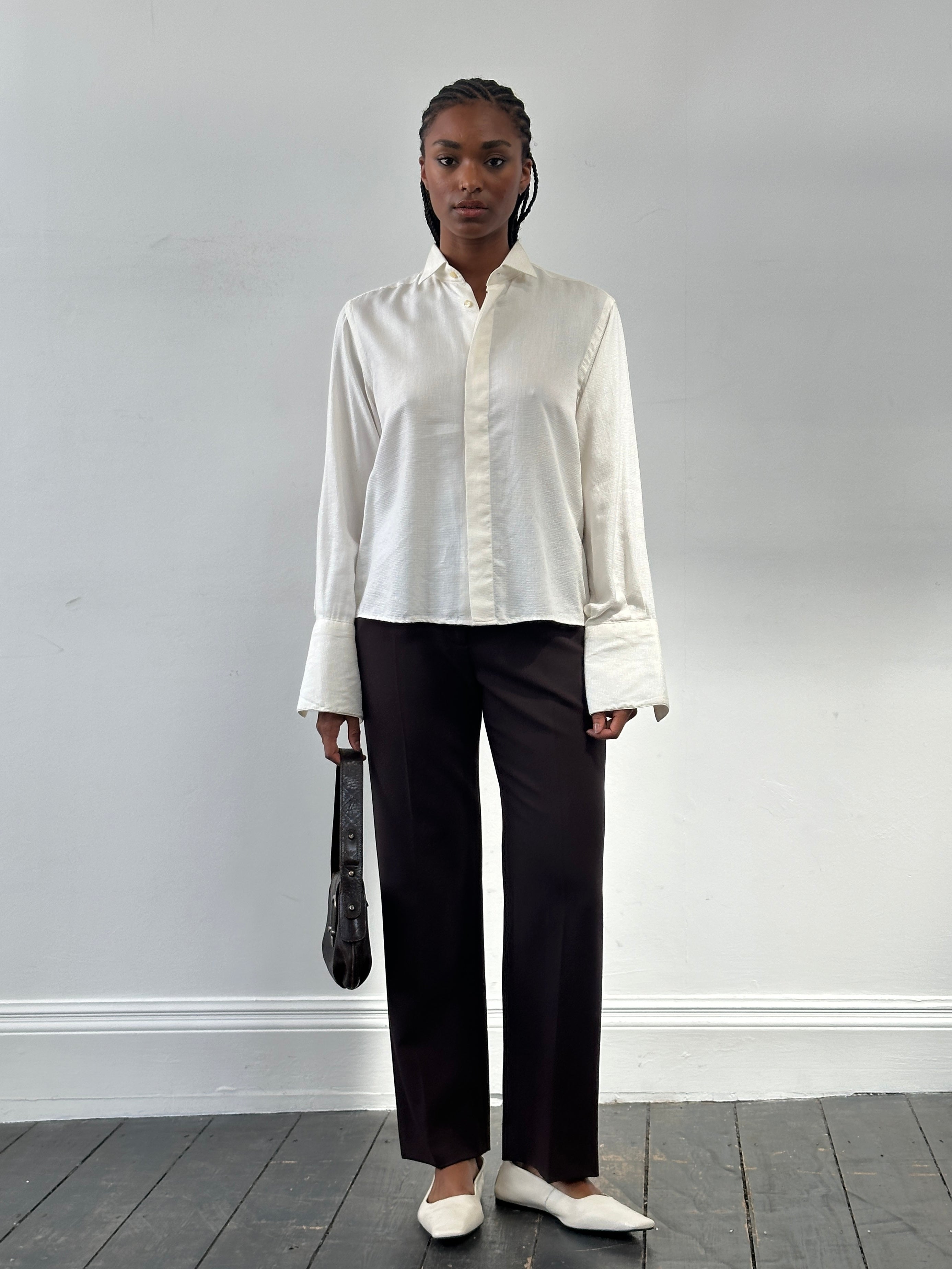 Vintage 1970s Italian wing collar boxy dress shirt in size M, featuring a classic collar and relaxed fit, displayed on a hanger.