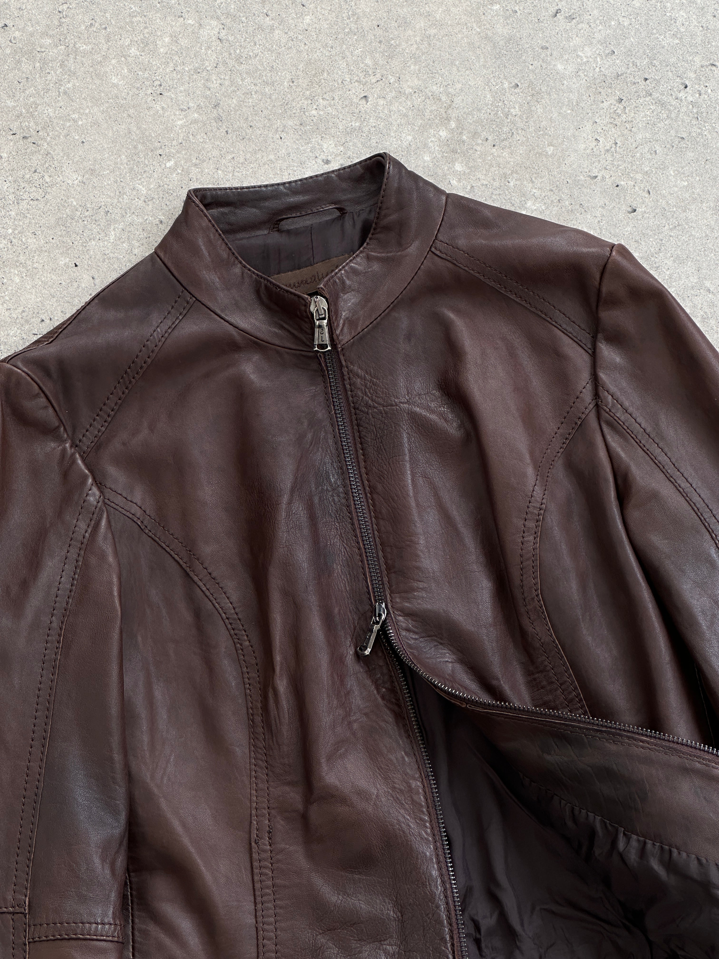 Vintage Italian double zip biker leather jacket with classic style, featuring silver zippers and a fitted design in size small.