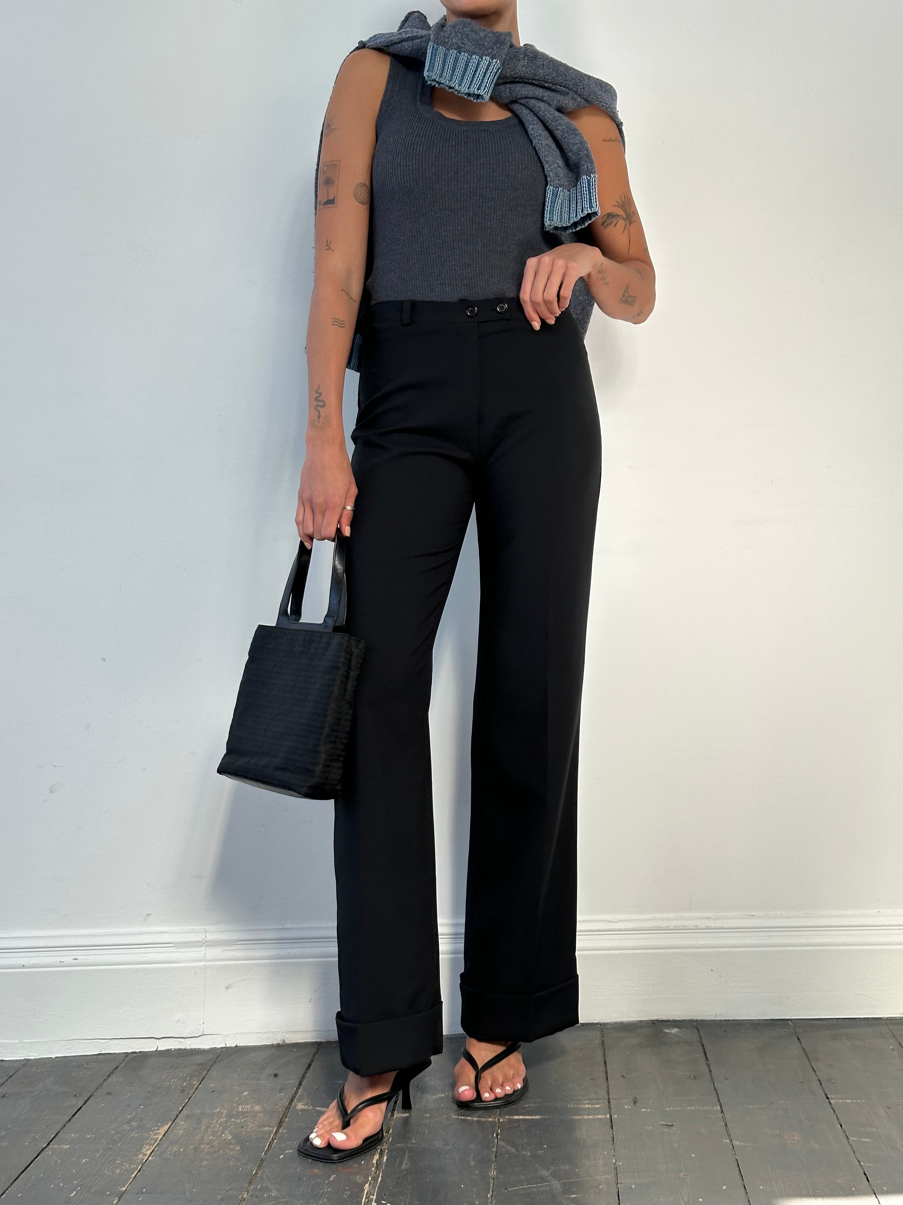 Vintage Italian mid-waisted straight-leg tailored trousers in classic fabric, size W28, displayed on a neutral background.