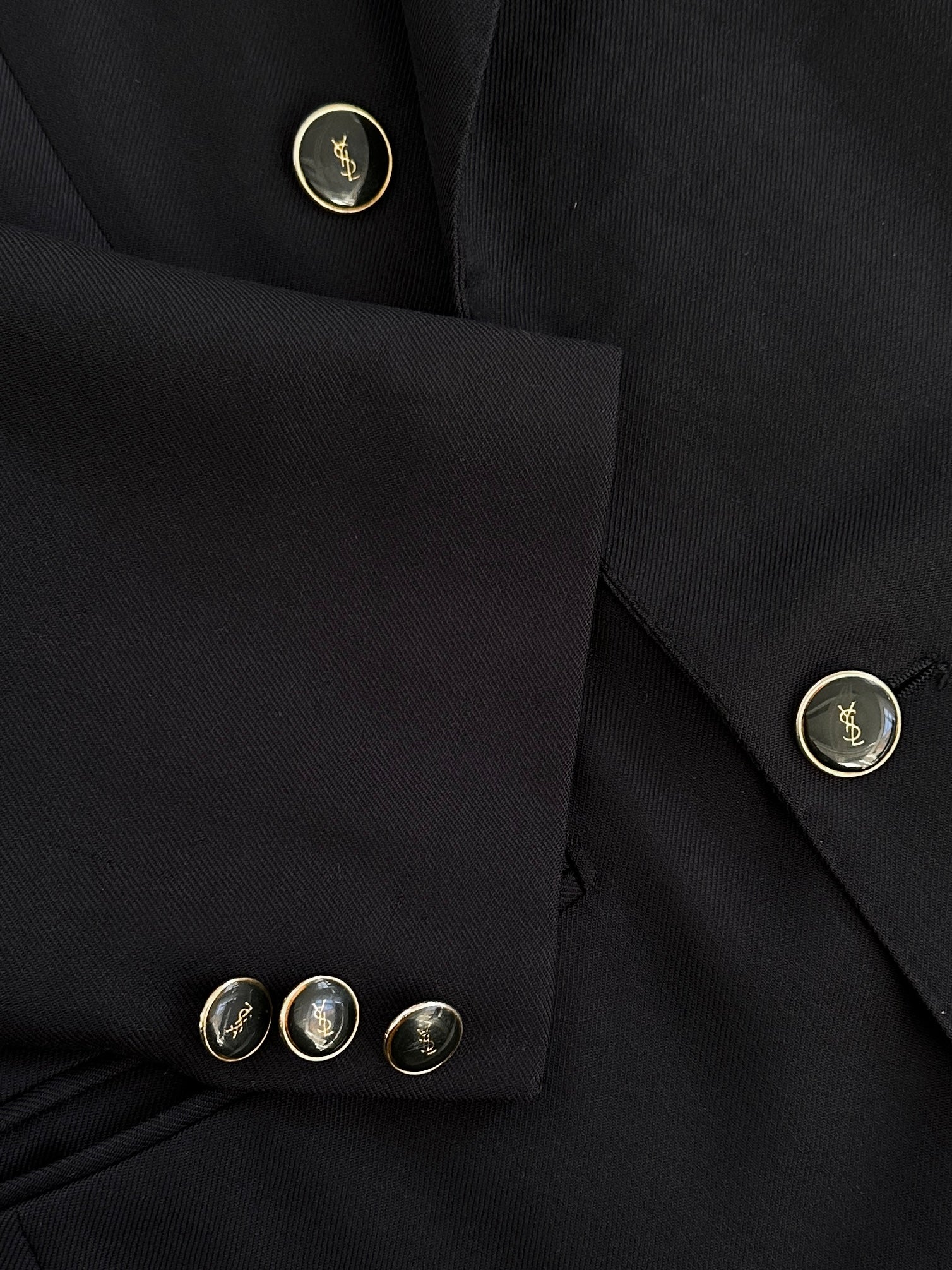 Yves Saint Laurent 1990s bespoke button wool double-breasted blazer in size 38R/M, tailored fit, dark classic color.