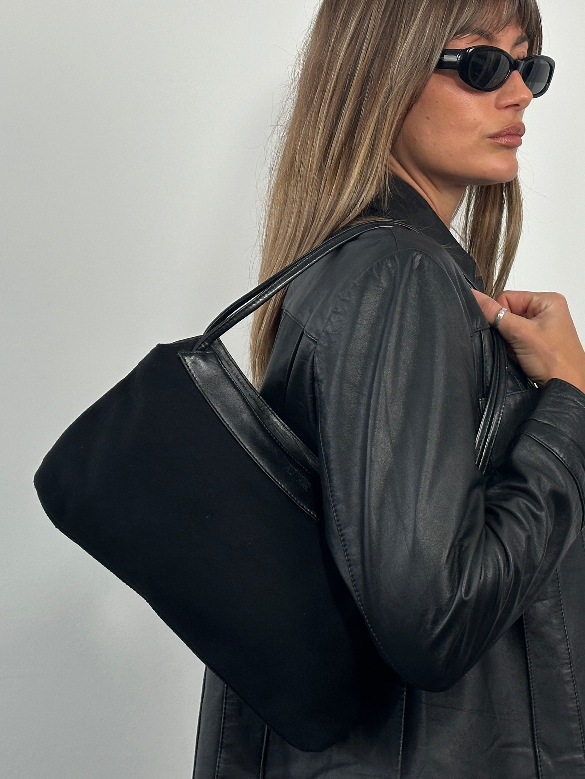 Armani Jeans 2000s wool shoulder bag with sleek design and neutral color, featuring a stylish and functional accessory.