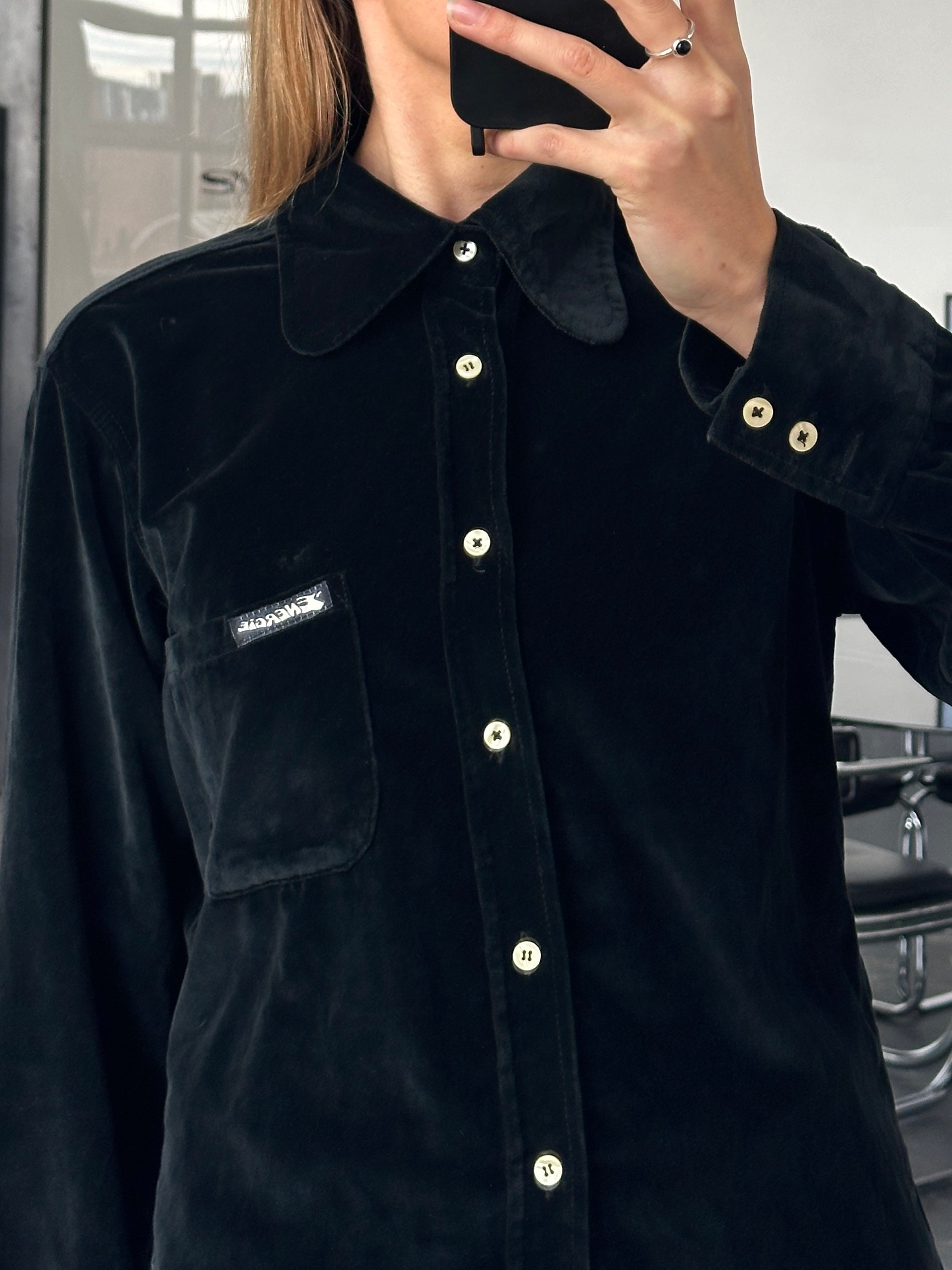 Vintage Italian 1990s velvet shirt in size M, featuring rich fabric and classic style, displayed on a hanger.