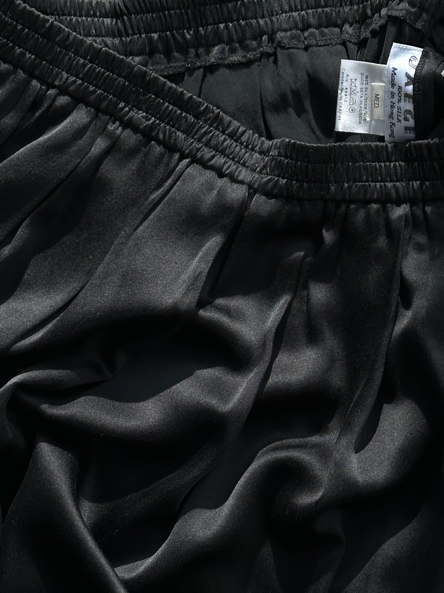 Jaeger pure silk elasticated pleated maxi skirt in W28, flowing fabric with pleats, shown on a model.
