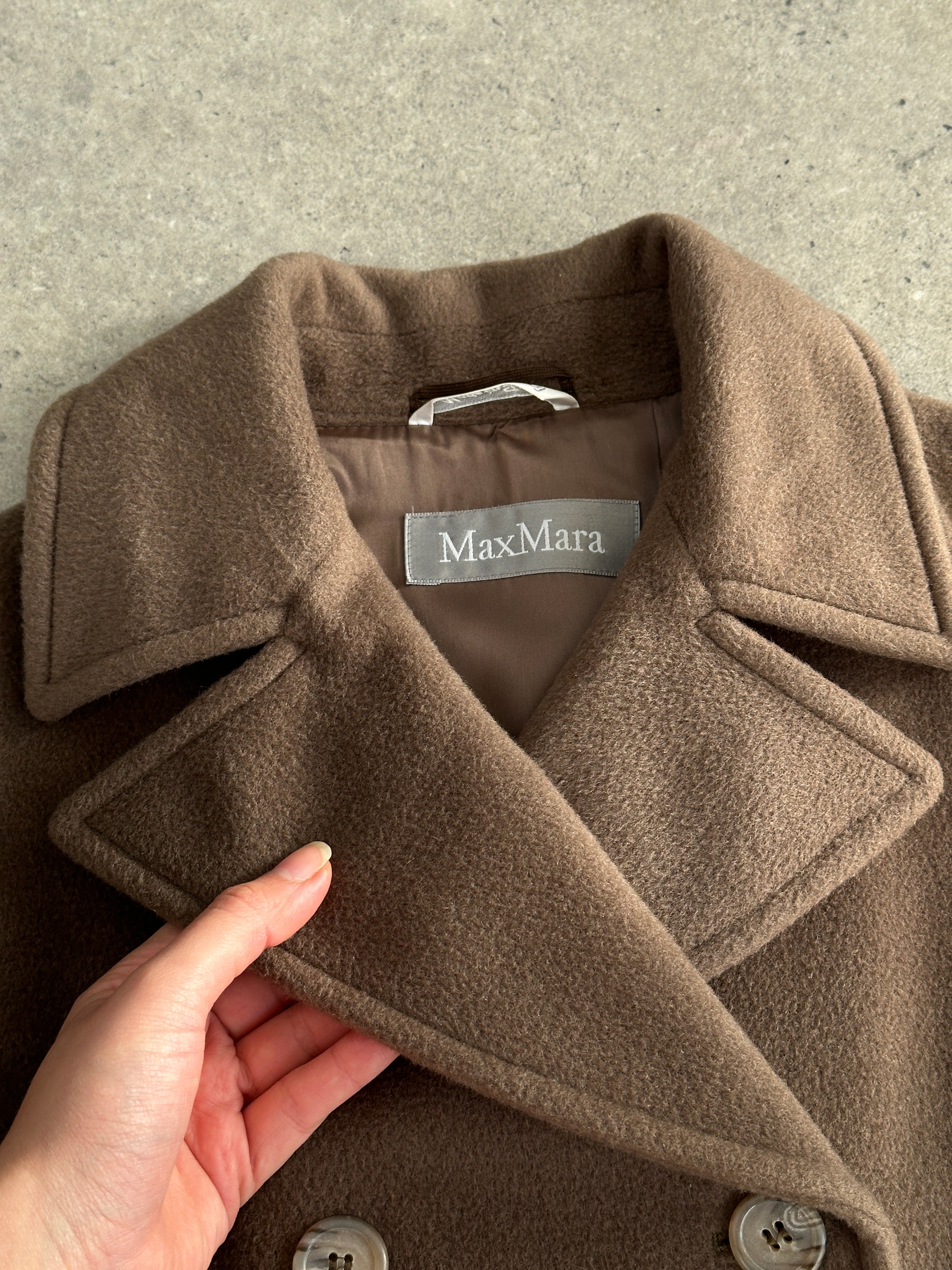 Max Mara pure wool double-breasted coat in size S, featuring classic lapels and tailored fit, displayed on a neutral background.