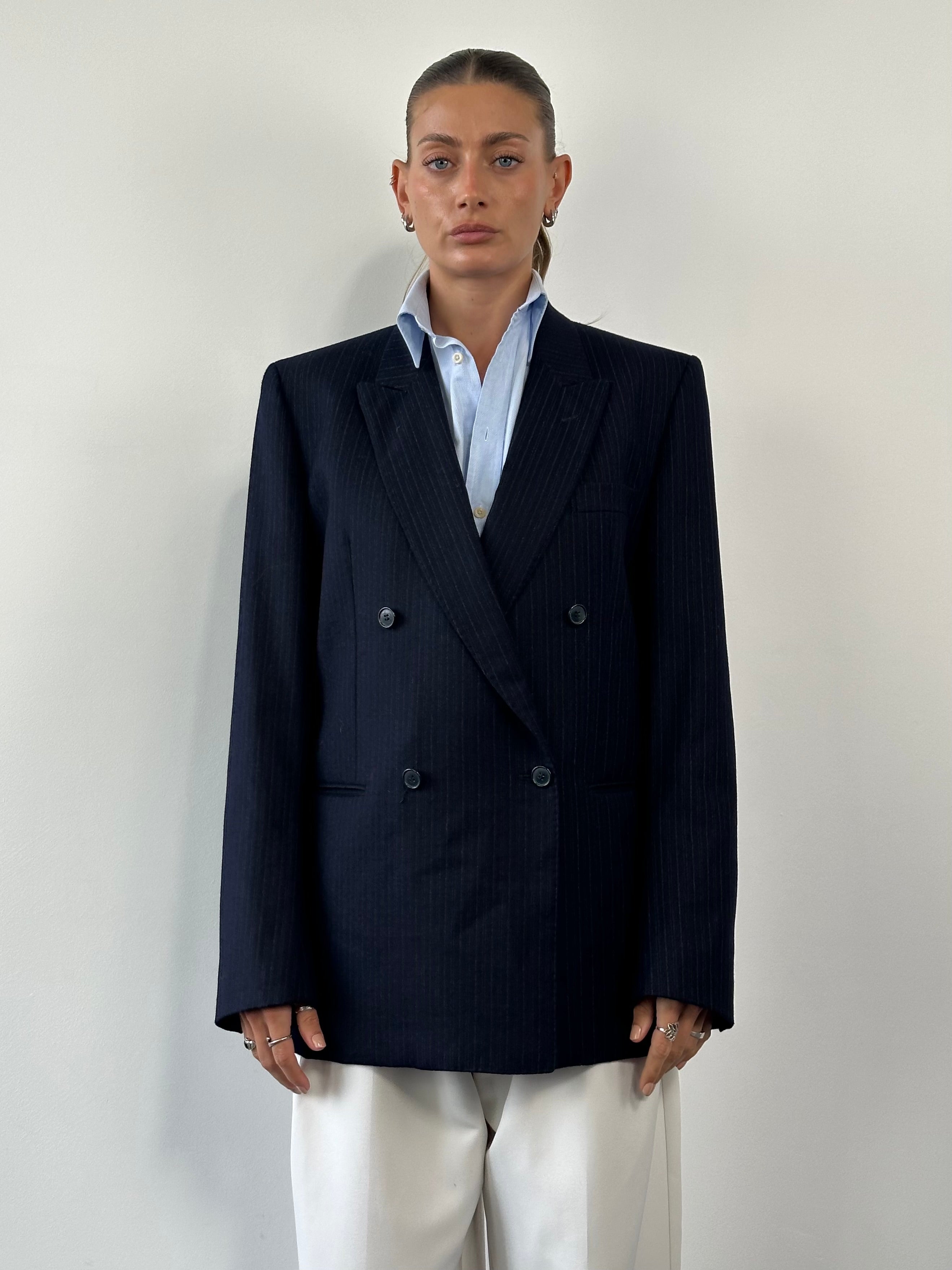 Vintage pure brushed wool stripe double-breasted blazer in size 42R/L, featuring classic tailored style and bold striped pattern.