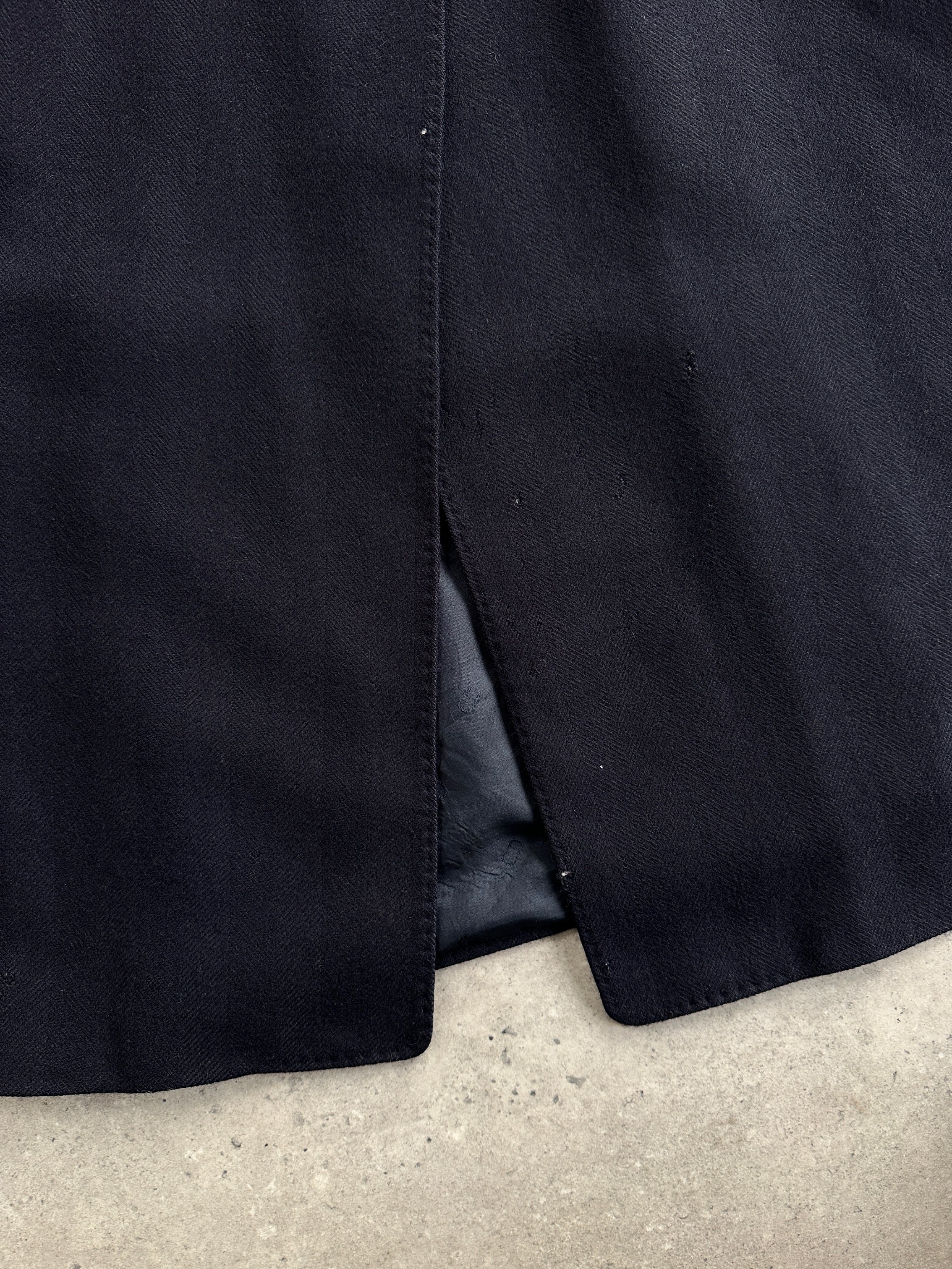 Christian Dior pure wool double-breasted coat in XL/XXL, featuring classic design and tailored fit, displayed on a hanger.