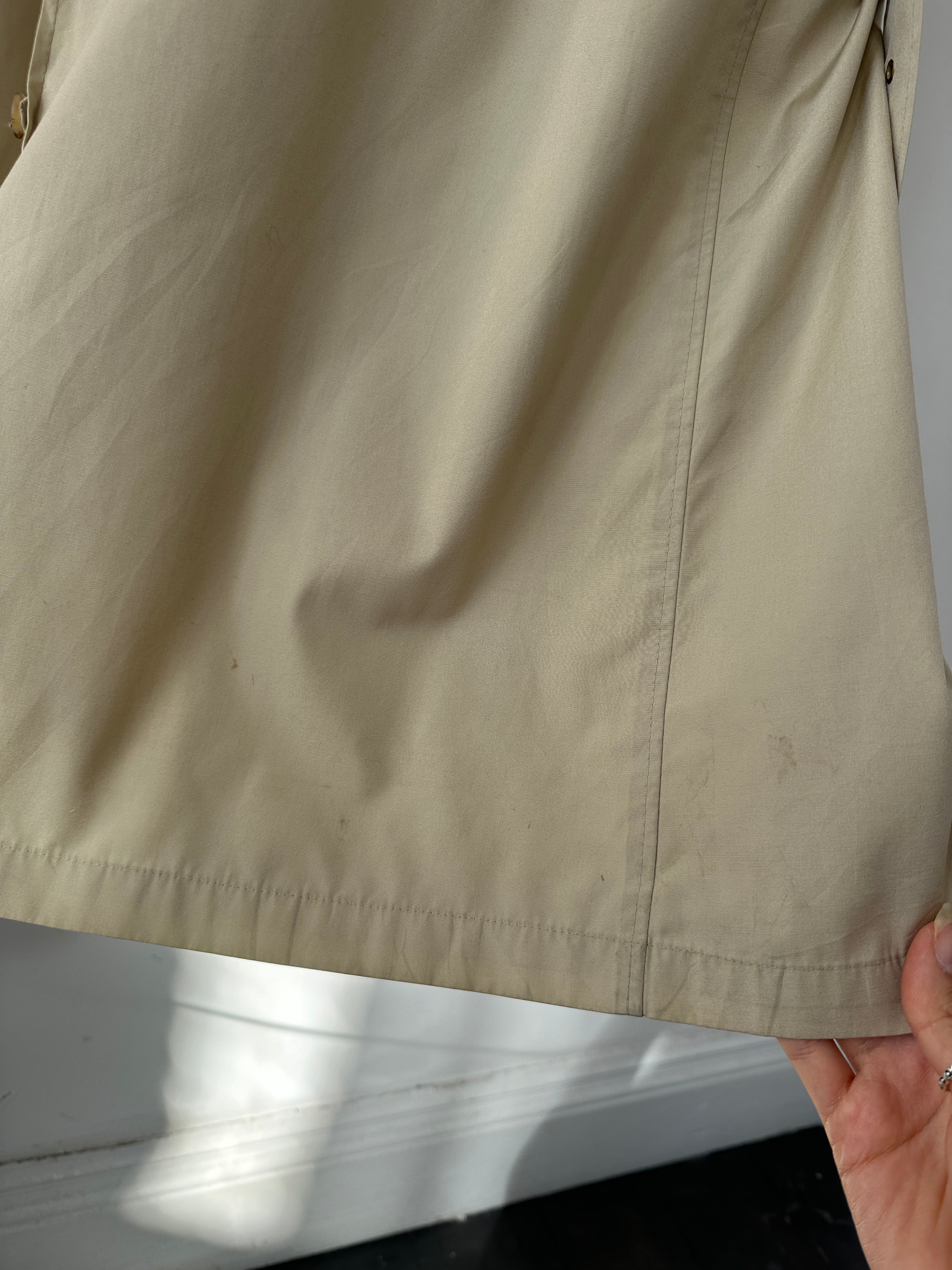 Christian Dior Paris cotton double-breasted belted trench coat in beige, size 40R/XL, with classic lapels and button details.