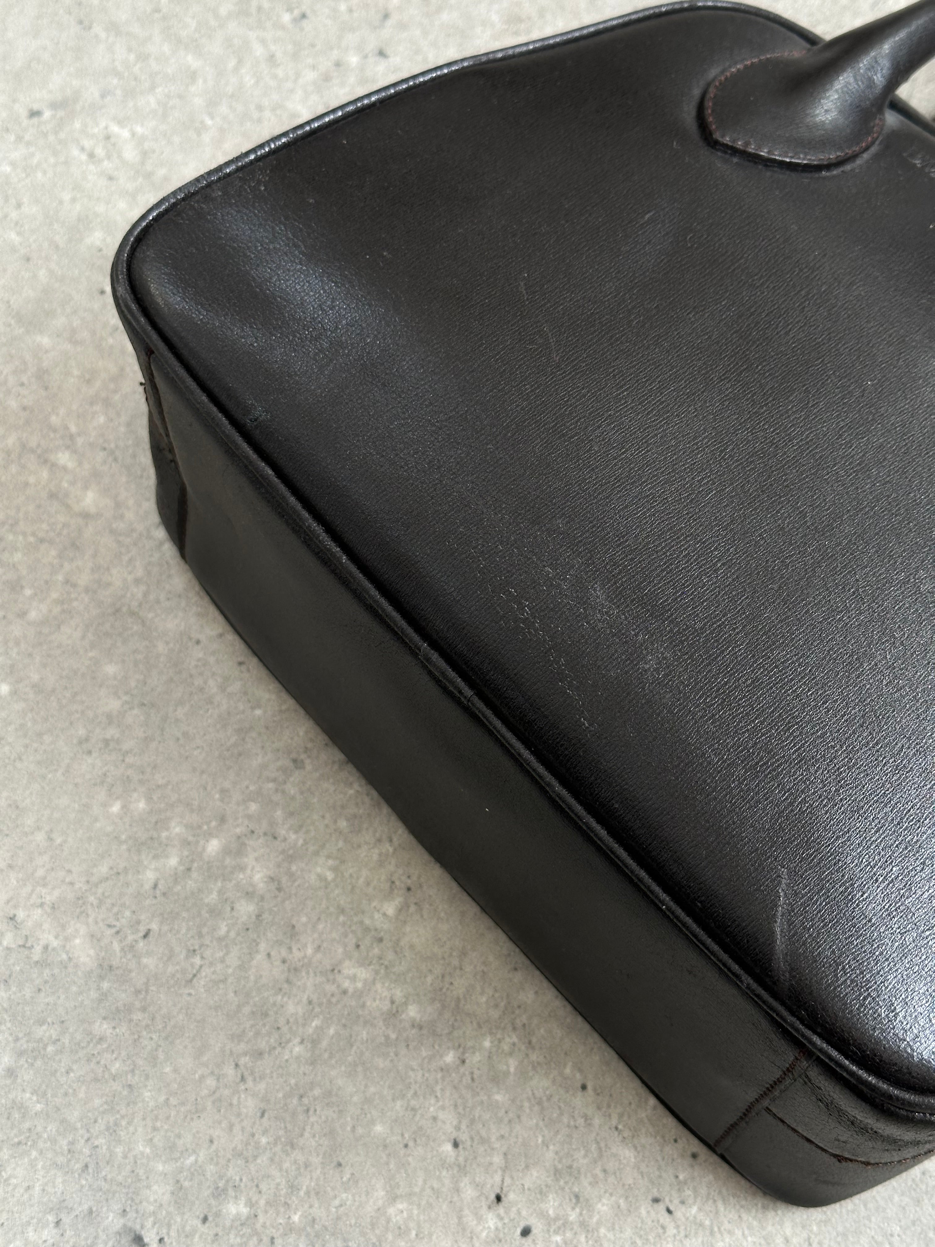 Emporio Armani 2000s leather handbag with sleek design, featuring top handles and subtle branding details.