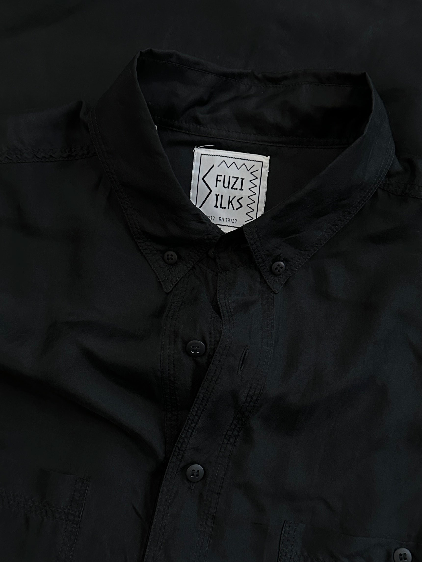 Vintage pure silk shirt in size L/XL, featuring a classic design with a smooth, shiny fabric and a relaxed fit.