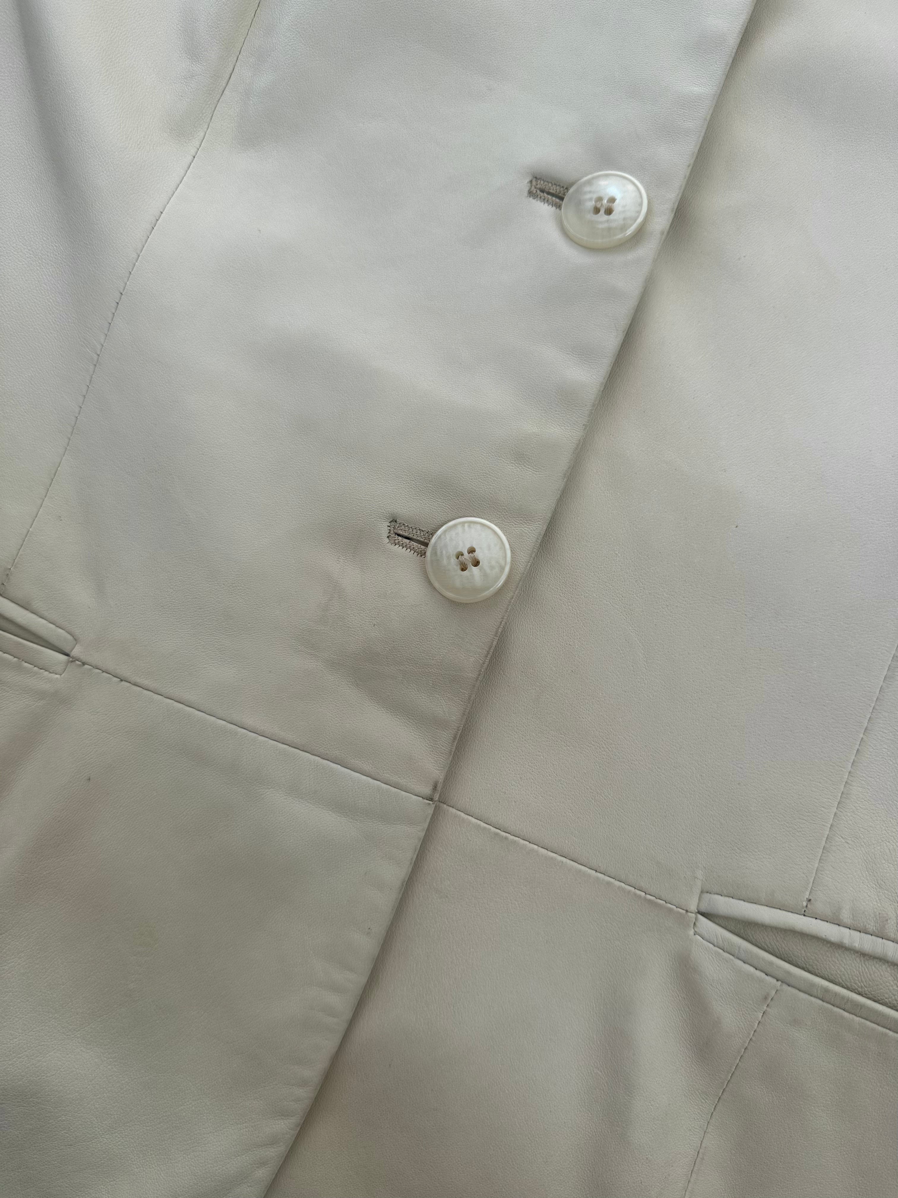Gianni Versace 1990s leather jacket in black, full view showcasing classic design and premium leather material.
