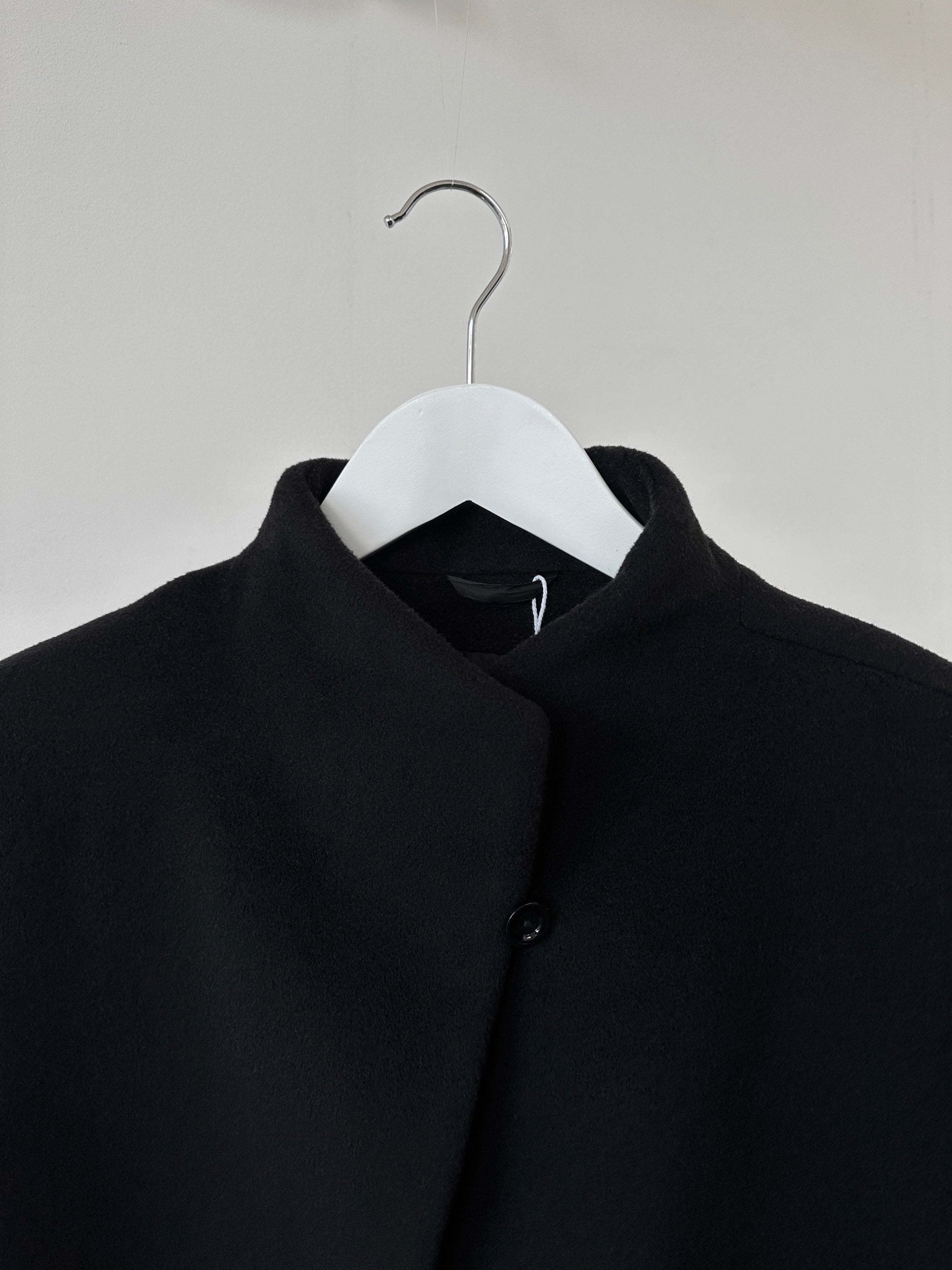 Cinzia Rocca minimal high neck pure wool coat in beige, full view showing tailored design and clean silhouette.