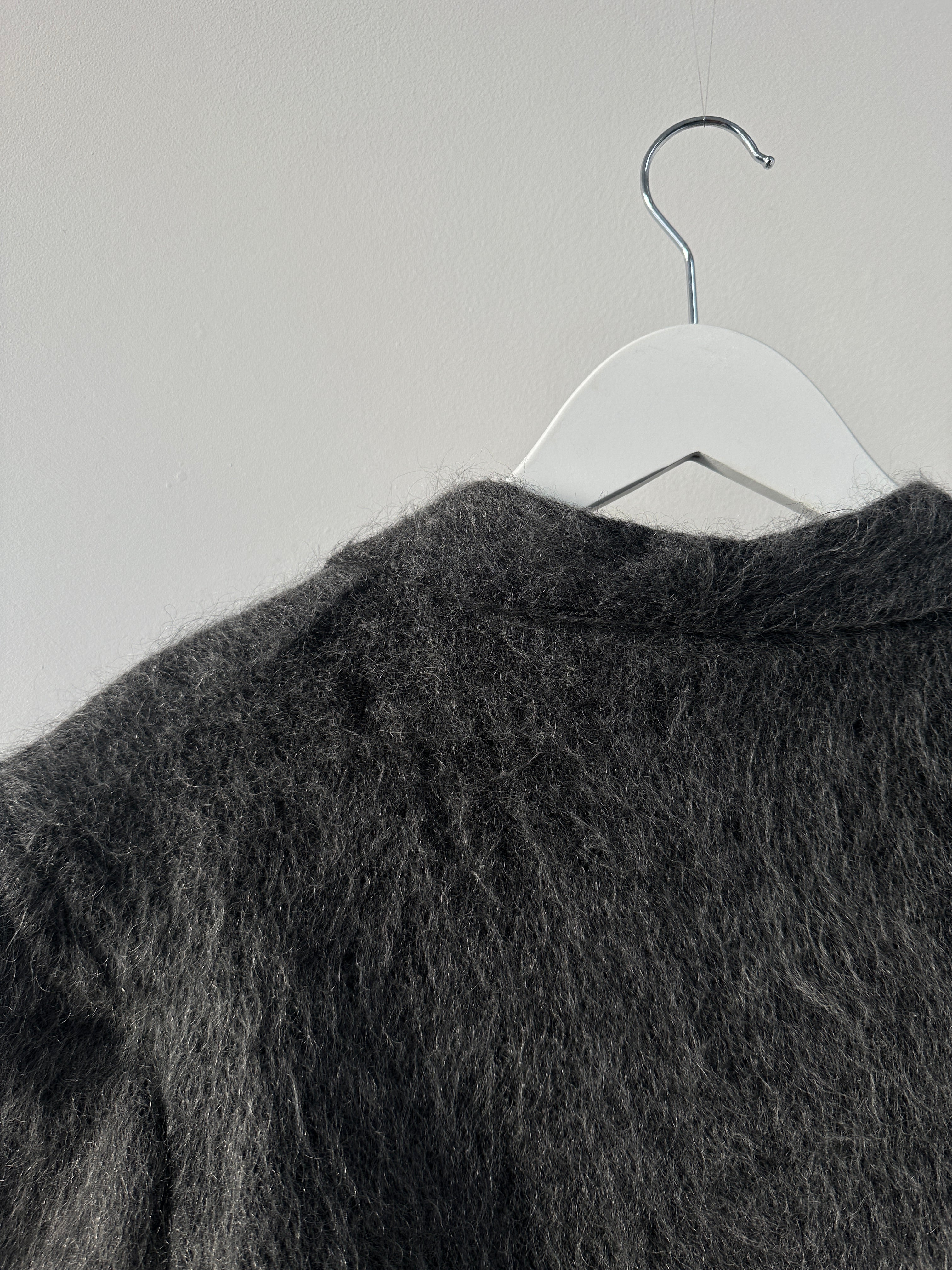 Emporio Armani fuzzy wool mohair single-breasted coat in size M, shown hanging on a wooden hanger with a neutral background.