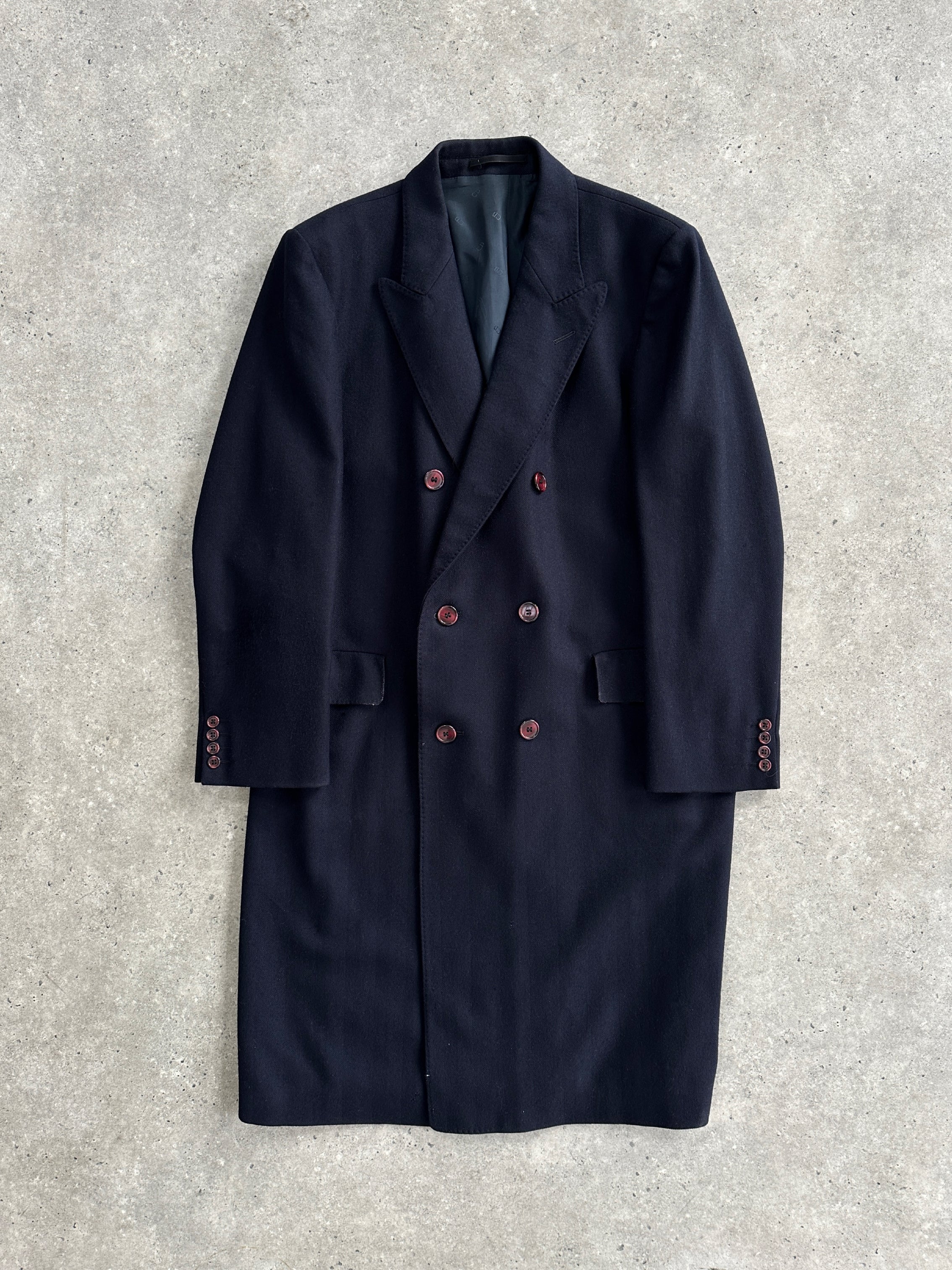 Christian Dior pure wool double-breasted coat in size XL/XXL, shown in a stylish, tailored design with classic lapels and button details.