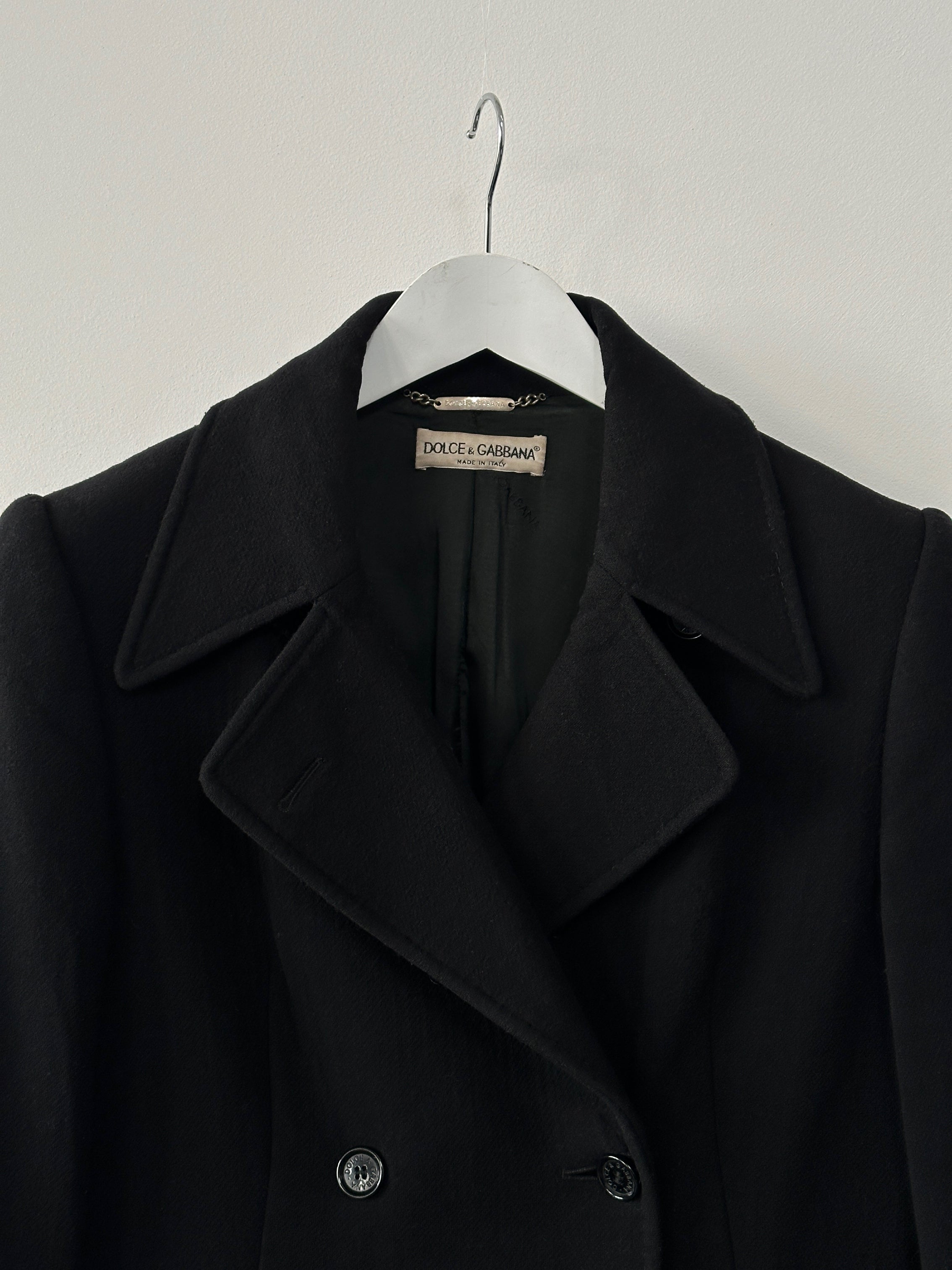 Dolce & Gabbana wool floor-length double-breasted coat in black, featuring classic lapels and tailored fit.