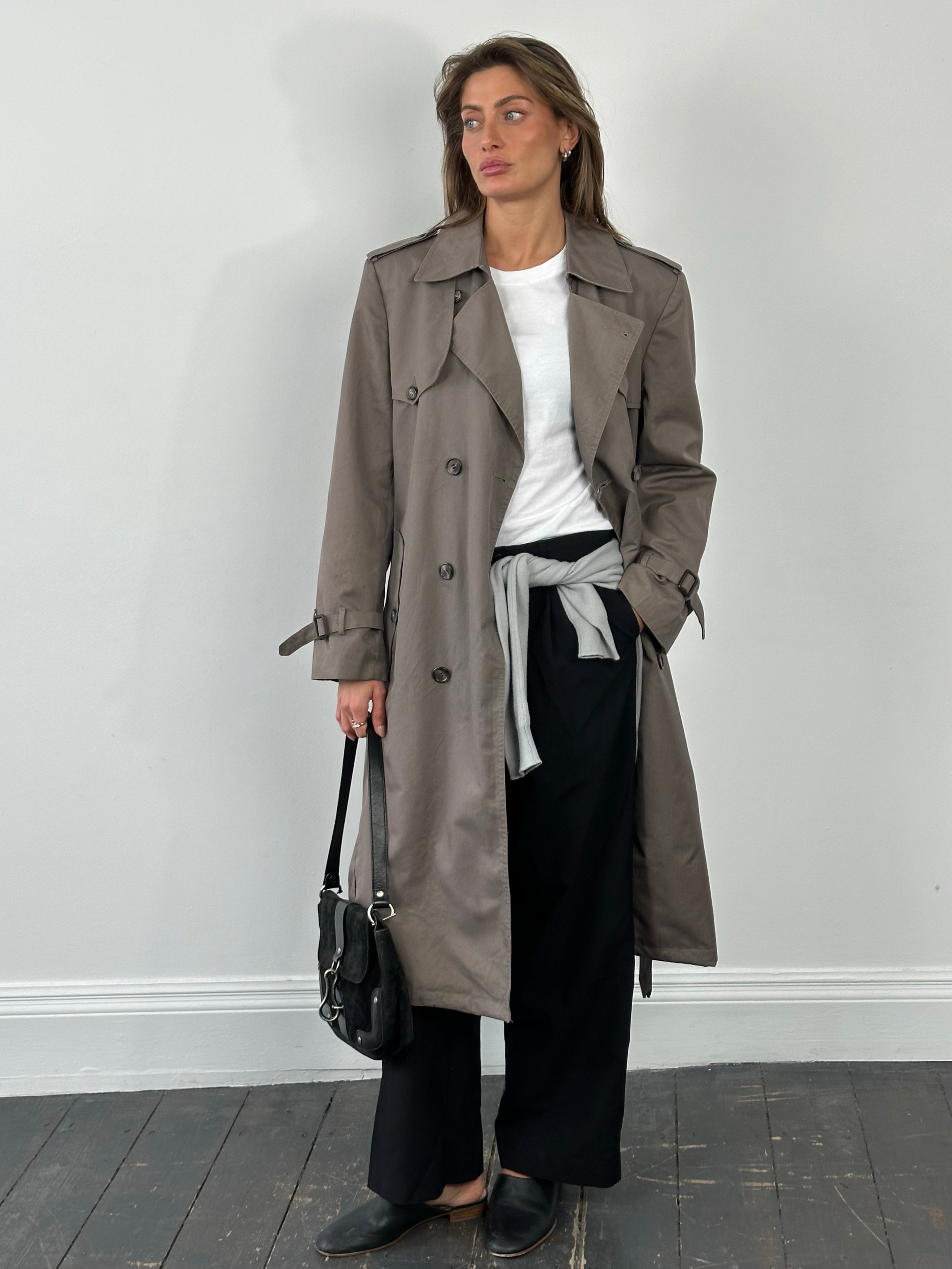 Christian Dior Monsieur 1980s double-breasted belted trench coat, stylish beige coat with classic design and belt detail.
