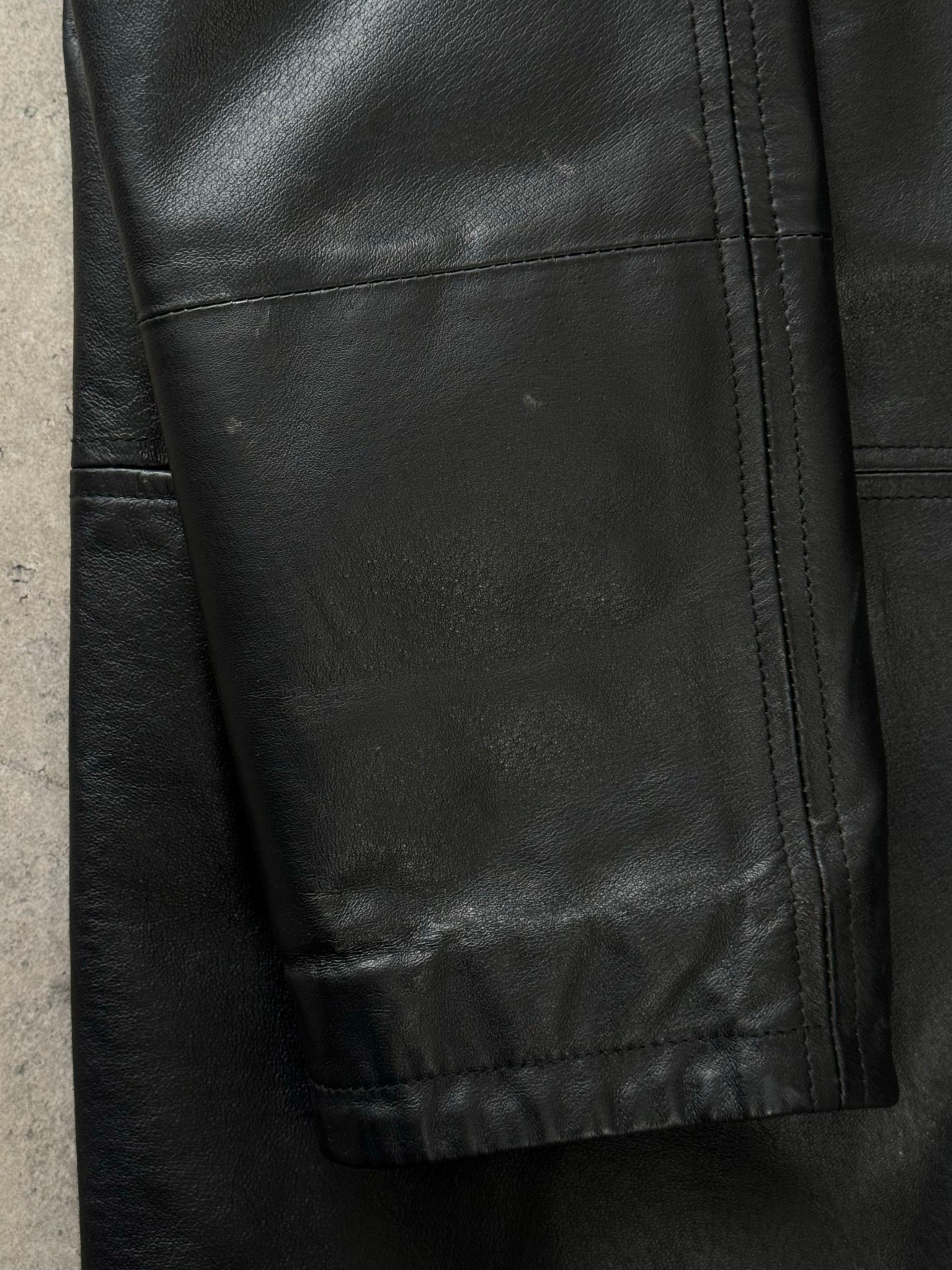 Vintage Italian 1990s single-breasted leather jacket, size large, shown on a hanger with classic design and rich leather texture.
