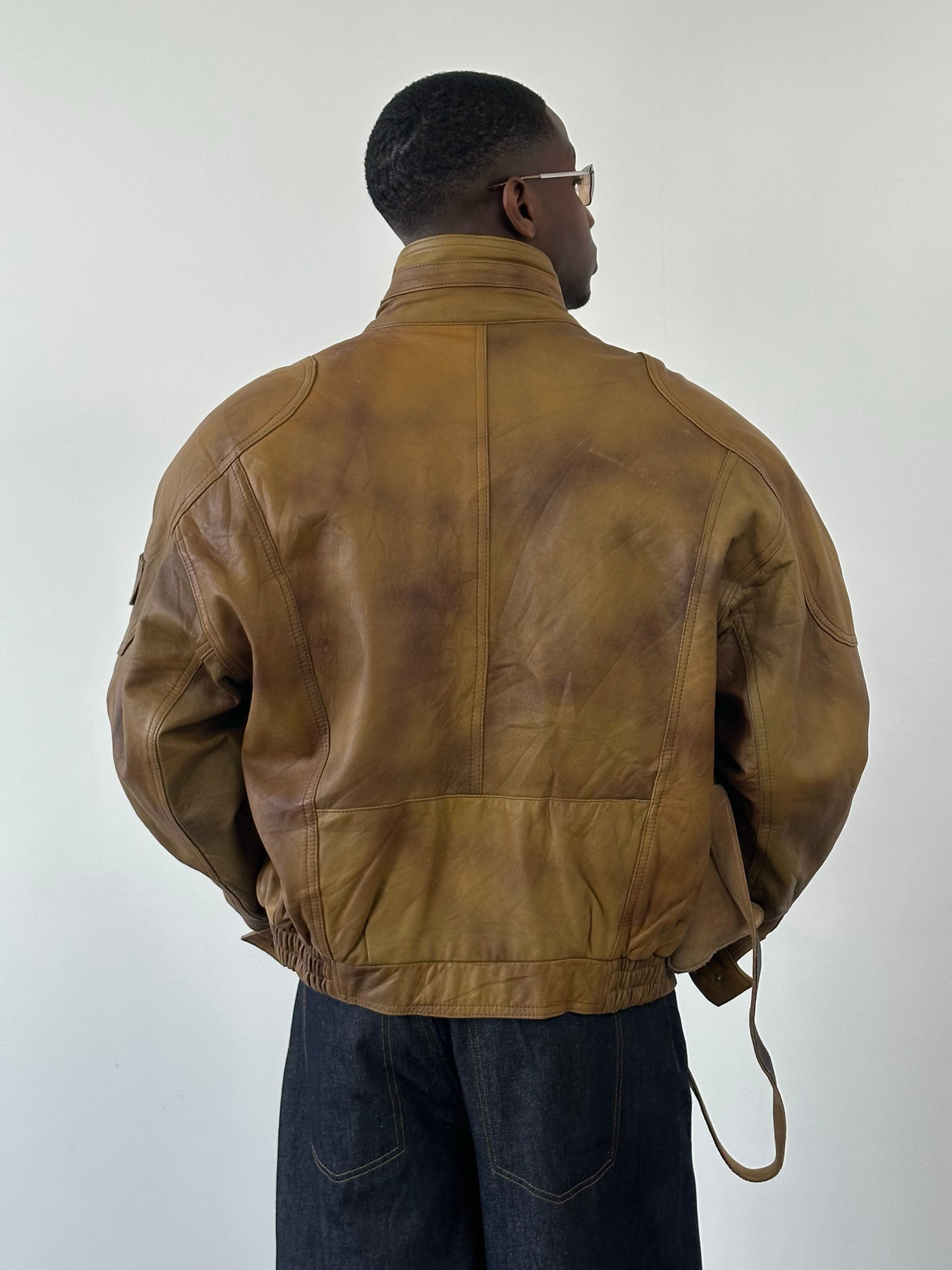 Vintage 1990s high neck leather bomber jacket in classic brown leather, stylish and durable, L size, vintage fashion for men or women.