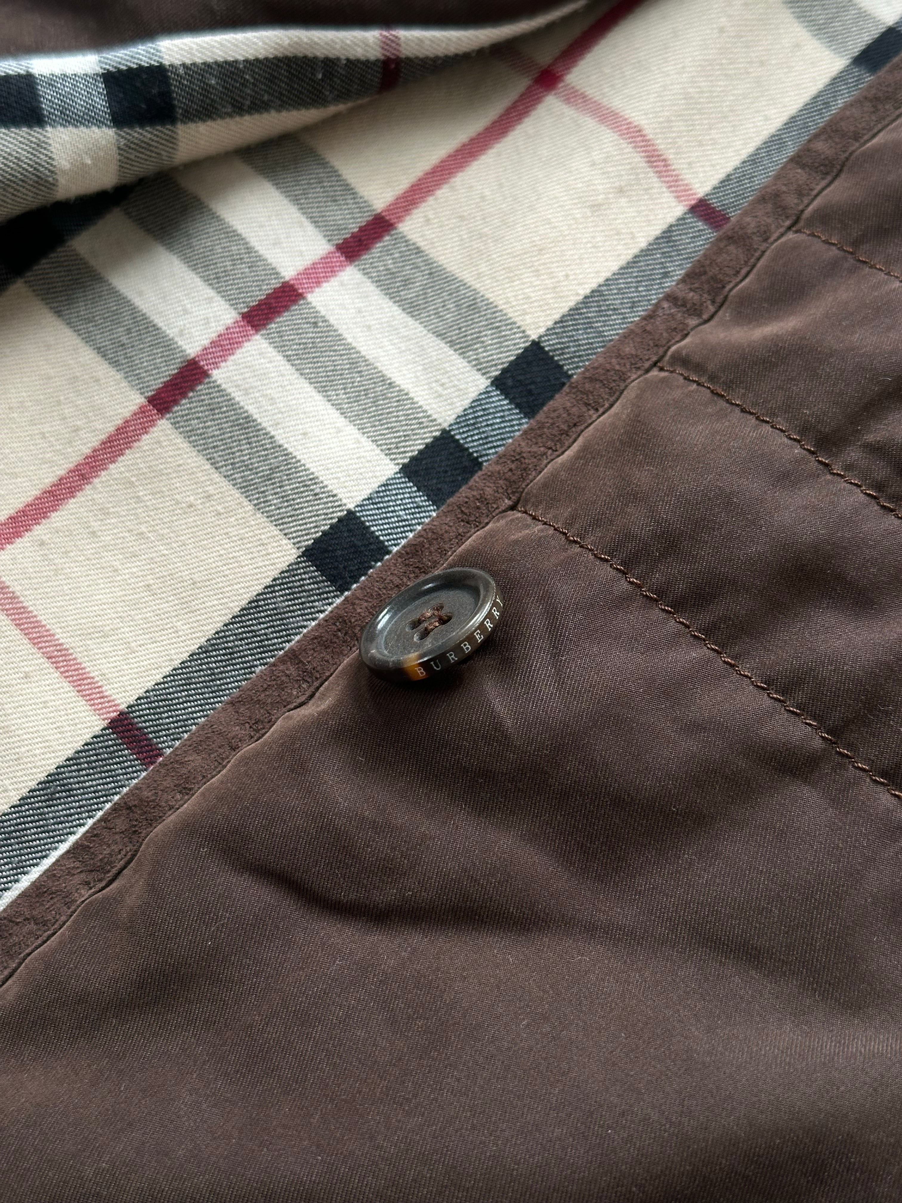 Burberry London 2000s cotton check jacket in size M, shown on model with classic Burberry plaid pattern and tailored fit.