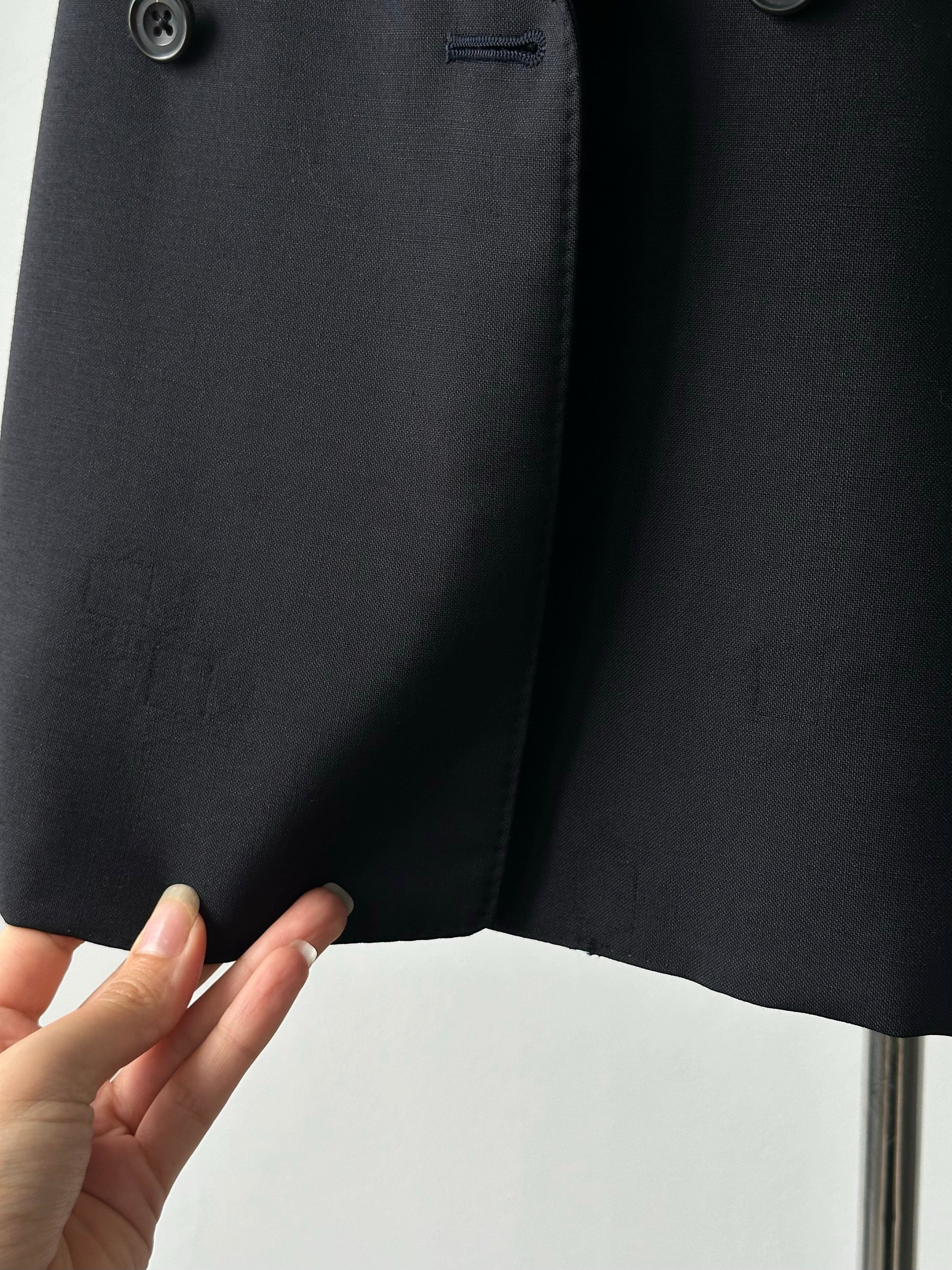 Burberry 1990s wool mohair double-breasted blazer in size L/XL, featuring classic tailored design and check pattern details.