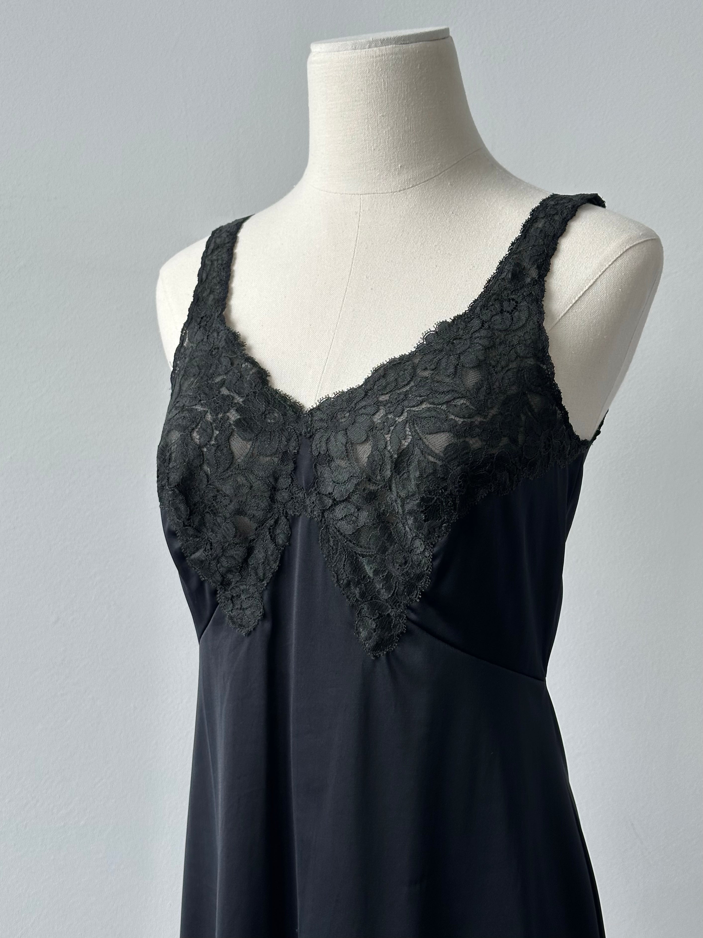 Vintage Italian 1990s lace mini dress, size S, featuring intricate lace details and classic silhouette, styled for a retro look.