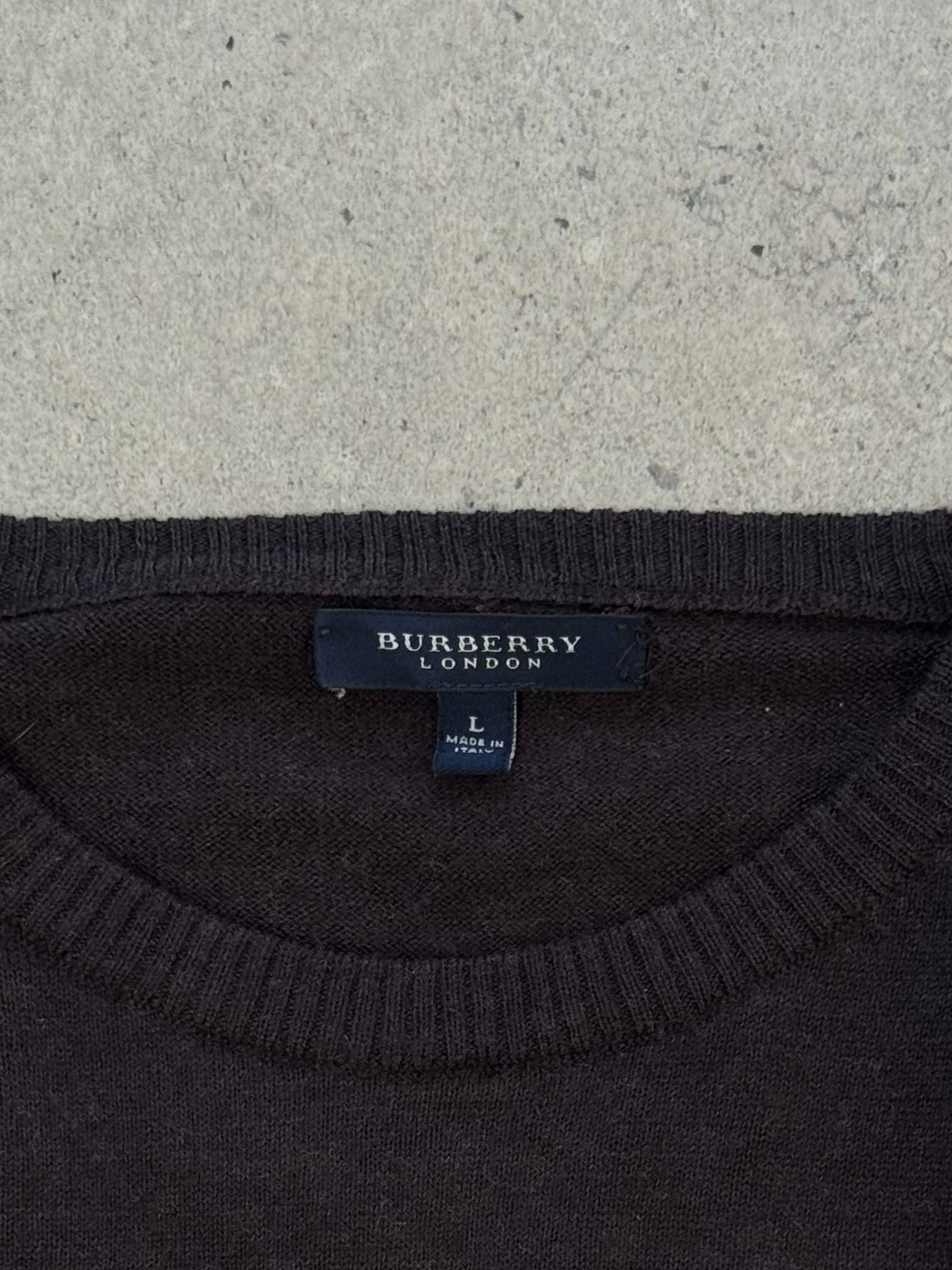 Burberry London 2000s wool knit jumper in size M, featuring classic design and textured knit pattern, displayed on a neutral background.