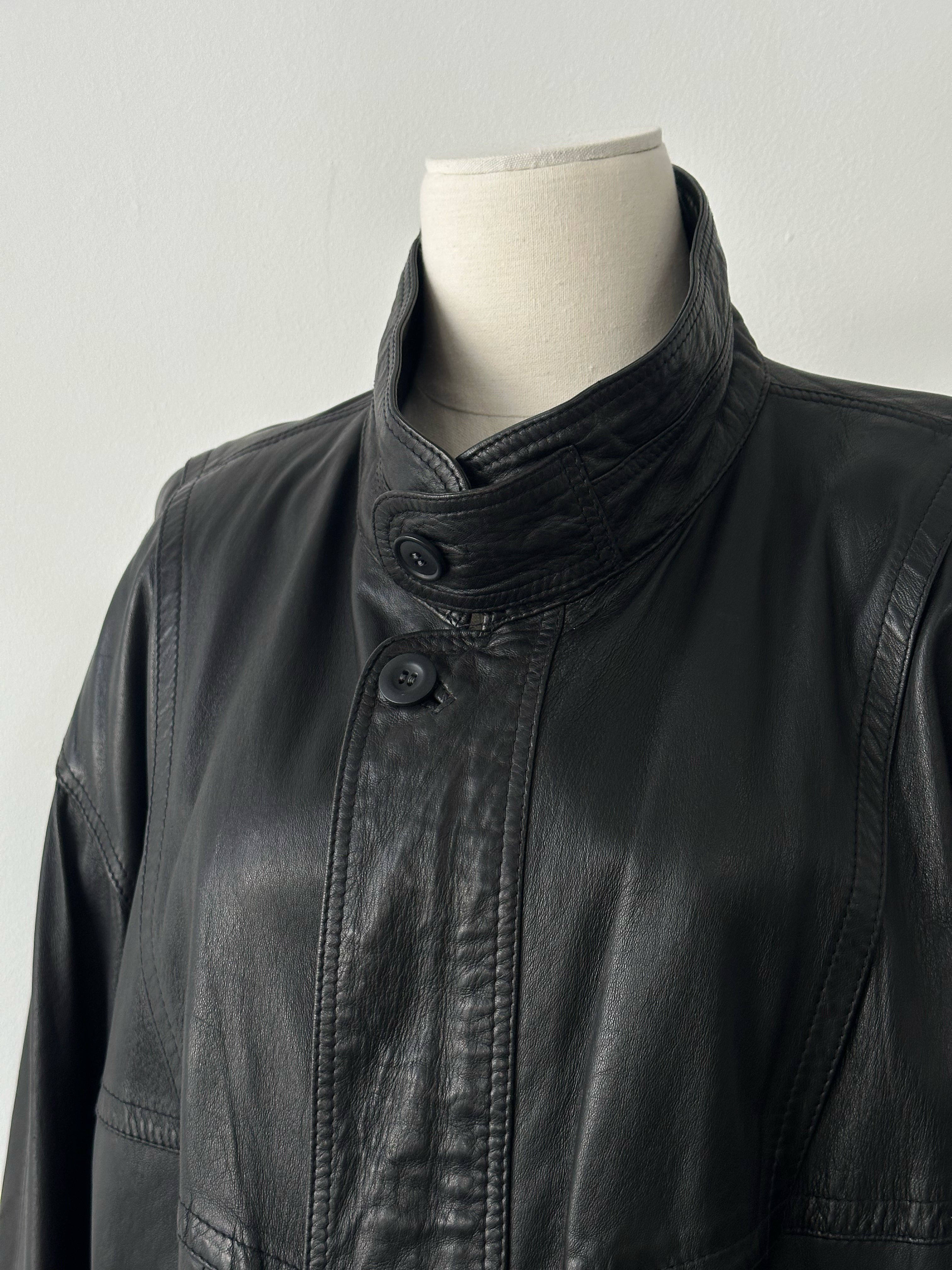 Vintage 1990s high-neck leather blouson bomber jacket, size large, featuring classic black leather and retro style details.