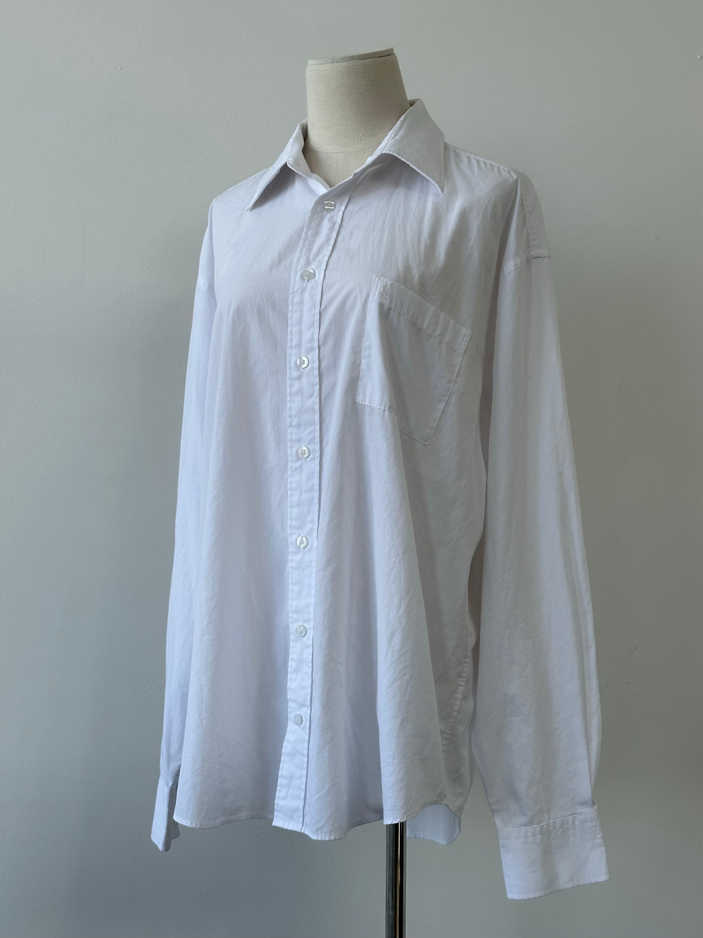 Yves Saint Laurent 1990s cotton logo shirt in XL, featuring the iconic YSL logo on the front, white fabric, and classic fit.
